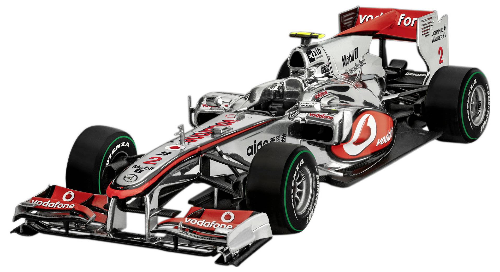 Elegantní vůz Formule 1 s detailními logy sponzorů, v převážně stříbrné a červené barvě, ukazující aerodynamický design.