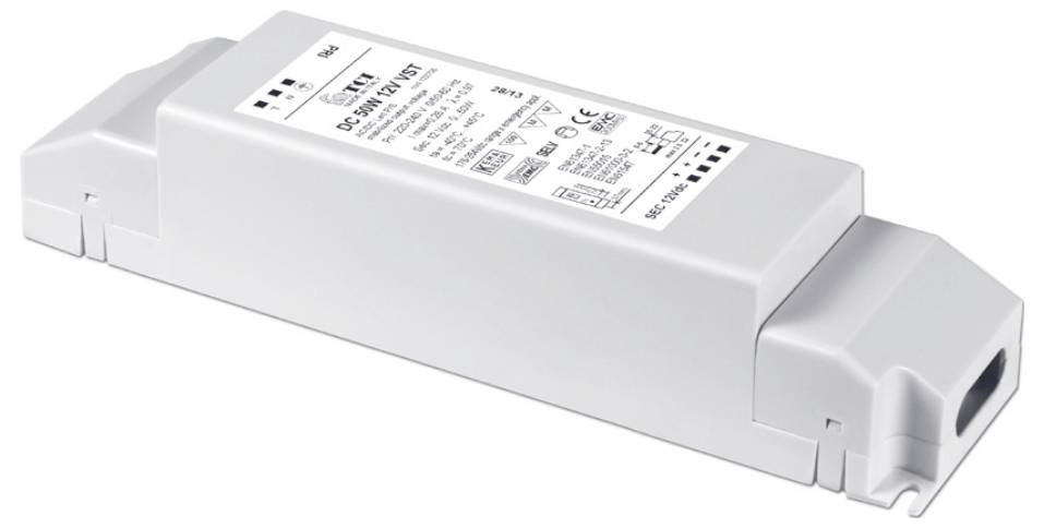 Obdélníkový bílý LED ovladač označený 'LED Power Supply' s detaily specifikace a certifikačními logy vytištěnými na něm.