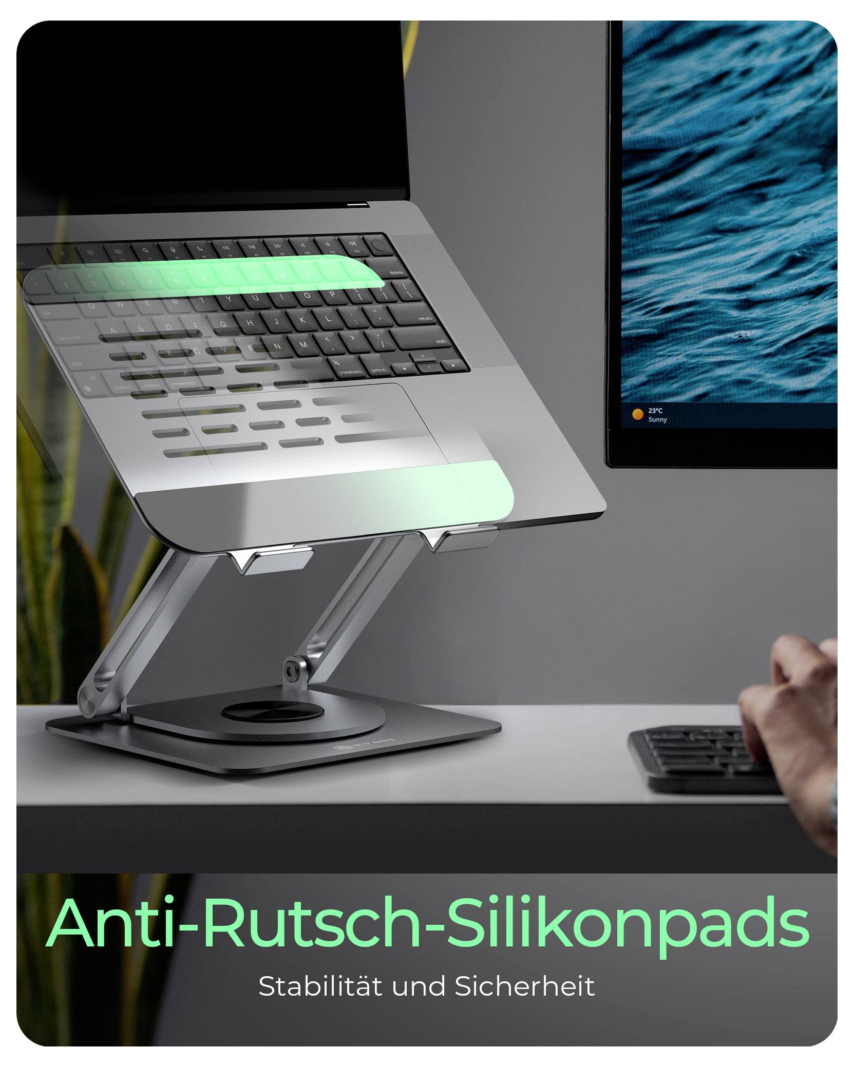 Laptop na stojanu, s textem 'Protiskluzové silikonové podložky: Stabilita a bezpečnost', který zdůrazňuje funkce stability.