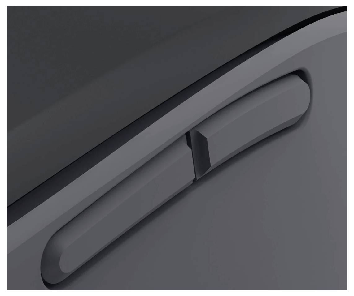 Detail detailu kliky automobilových dveří, který zdůrazňuje elegantní design a kovovou texturu na tmavě šedém pozadí.