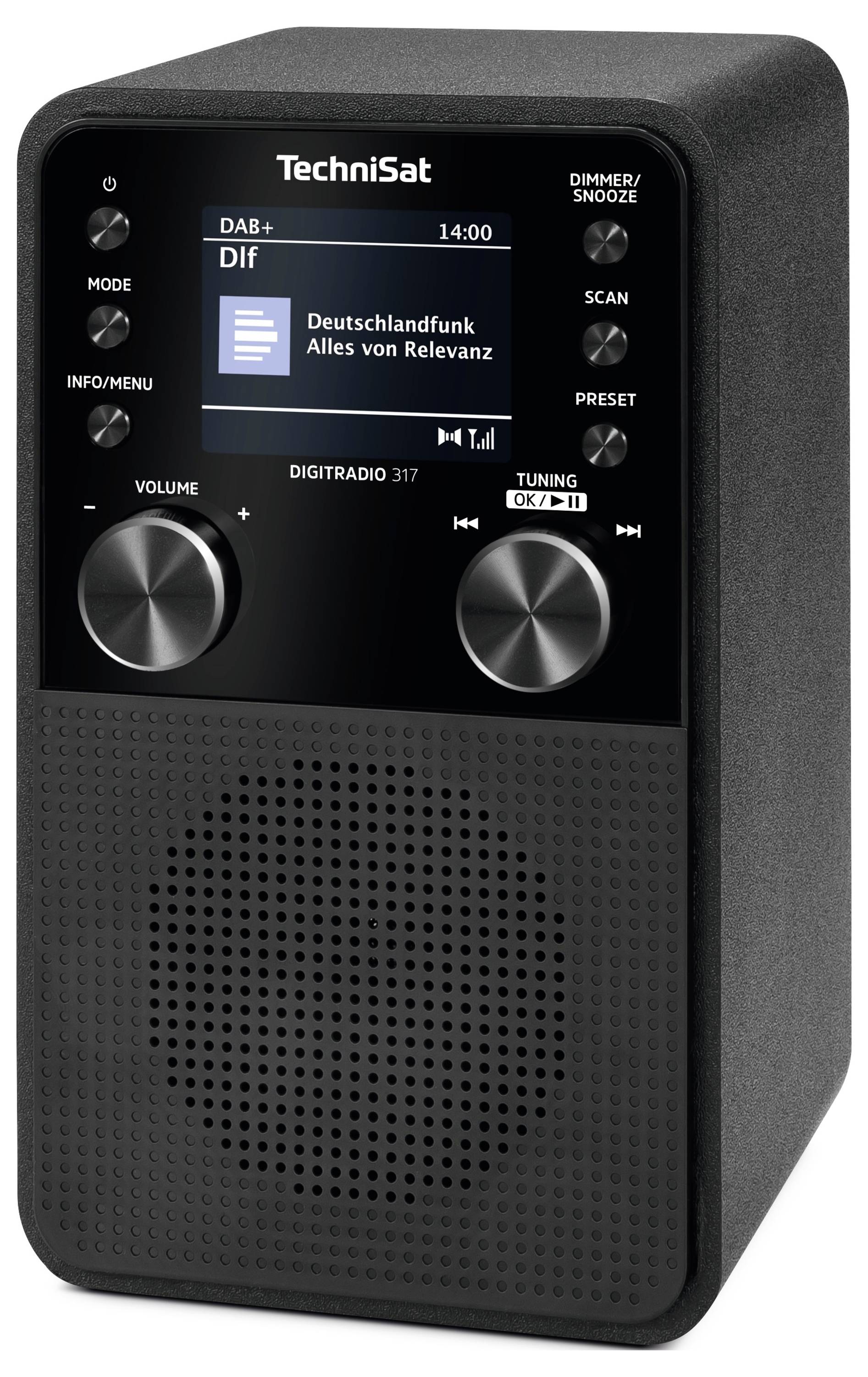 Černé digitální rádio s předním reproduktorem a obrazovkou zobrazující 'Deutschlandfunk - Alles von Relevanz', ovladači režimu a hlasitosti a tlačítky pro jednotlivé funkce.