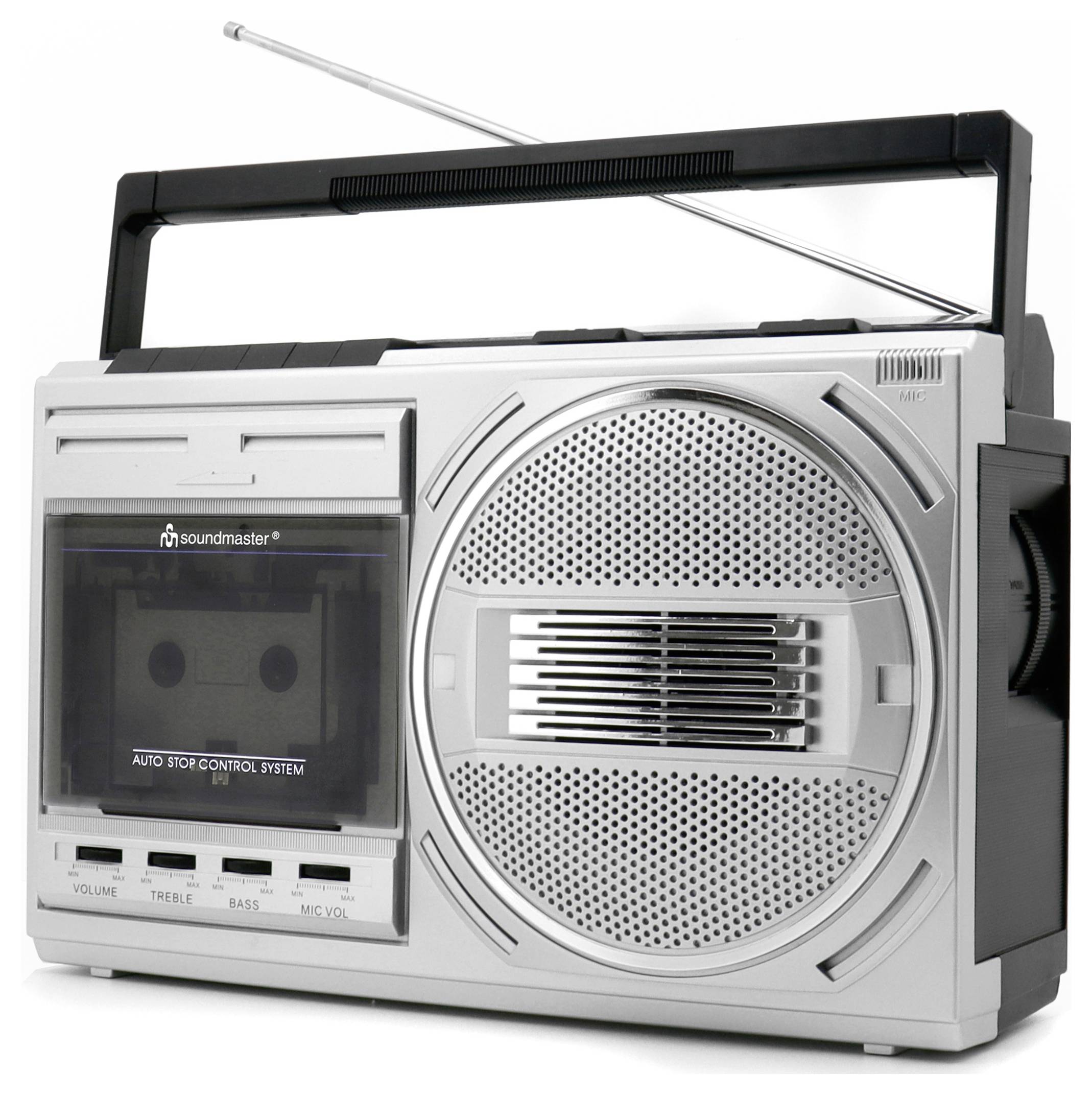 Vintage přenosné rádio s rukojetí, kazetovým přehrávačem, reproduktorem a vysunutou anténou. Má ovladače pro hlasitost, výšky a basy.