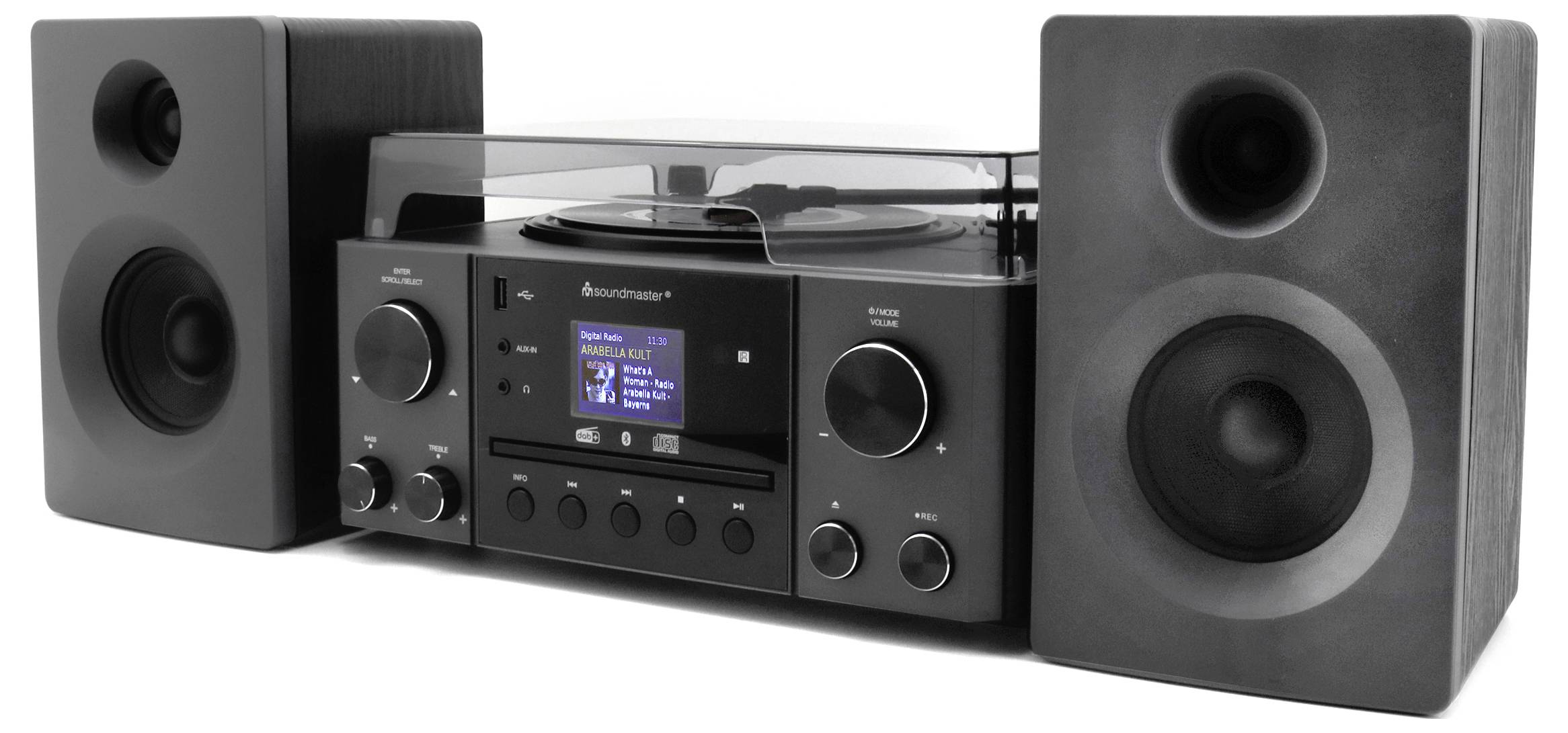 Černý stereofonní systém s gramofnem na vinylové desky, digitálním displejem zobrazujícím 'Právě hraje', a dvěma reproduktory, umístěný na bílém pozadí.