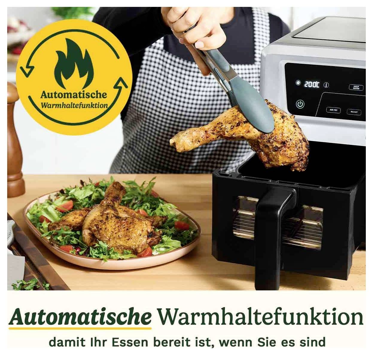 Ruka používá kleště k vyjmutí kuřecího stehýnka z horkovzdušné fritézy. Text: 'Automatická funkce udržení tepla'.