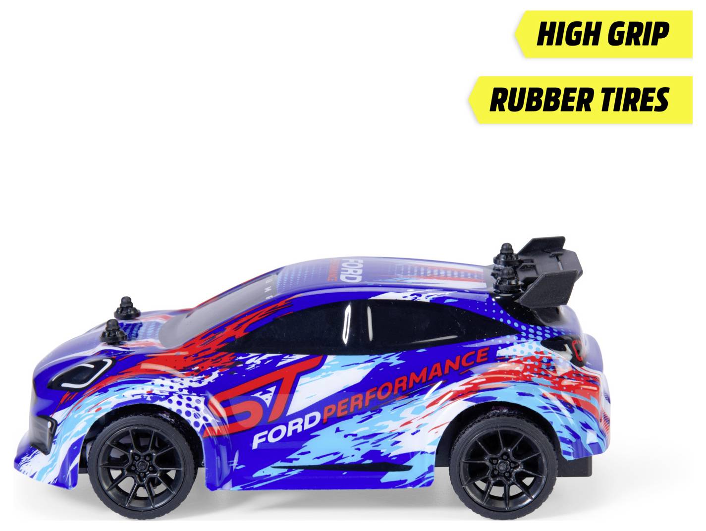 Barevné hračkářské auto s nápisem 'FORD PERFORMANCE' na boku, s aerodynamickým designem. Štítky zvýrazňují 'VYSOKOU PŘILNAVOST' a 'GUMOVÉ PNEUMATIKY'.