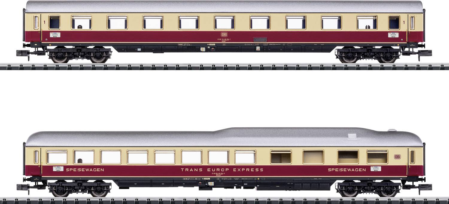 Modelové železniční vozy na kolejích, navržené tak, aby připomínaly klasické osobní vozy expresu Trans Europ Express s detailně zpracovanými vnějšími prvky.