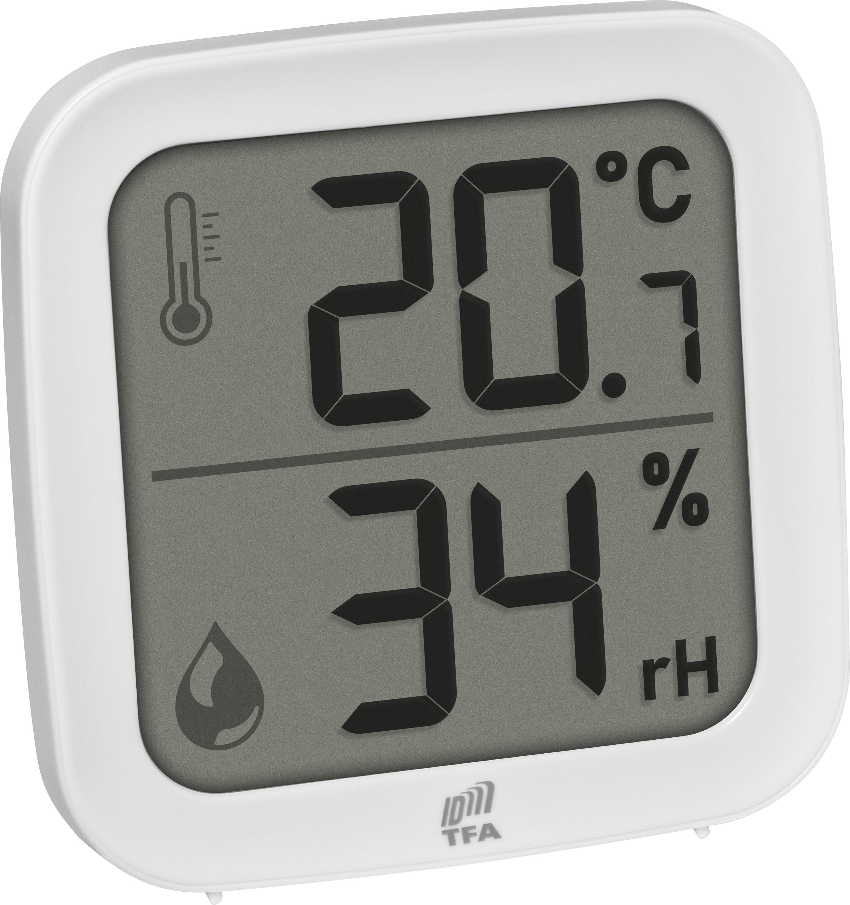 Digitální teploměr a vlhkoměr zobrazující '20,7 °C' a '34% rH', které signalizují teplotu místnosti a úroveň vlhkosti.