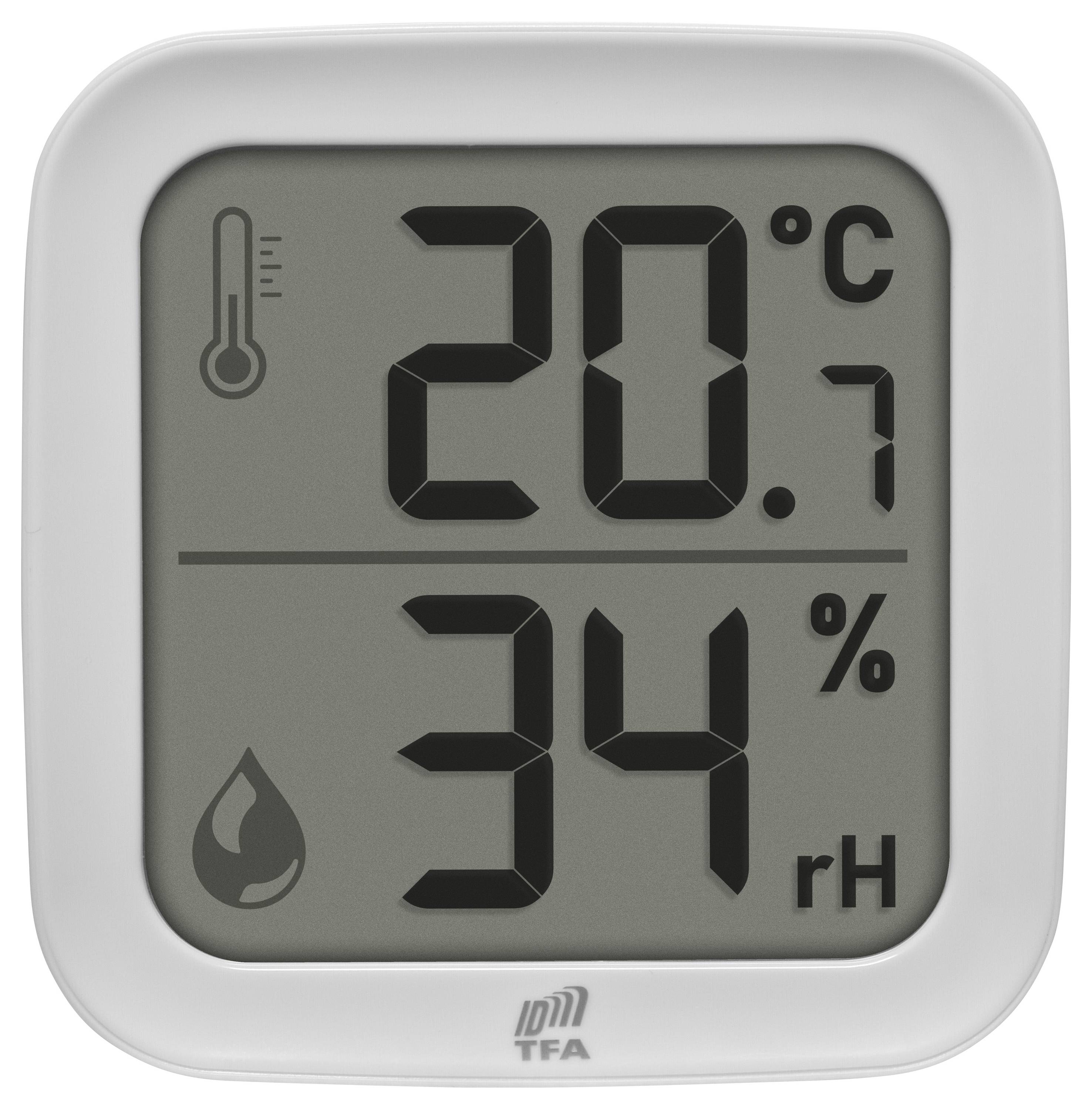 Digitální displej zobrazující teplotu '20,7 °C' a vlhkost '34% rH'.