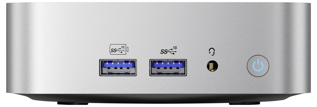 Kompaktní stříbrný stolní počítač s USB porty, audio jackem a tlačítkem napájení na přední straně.
