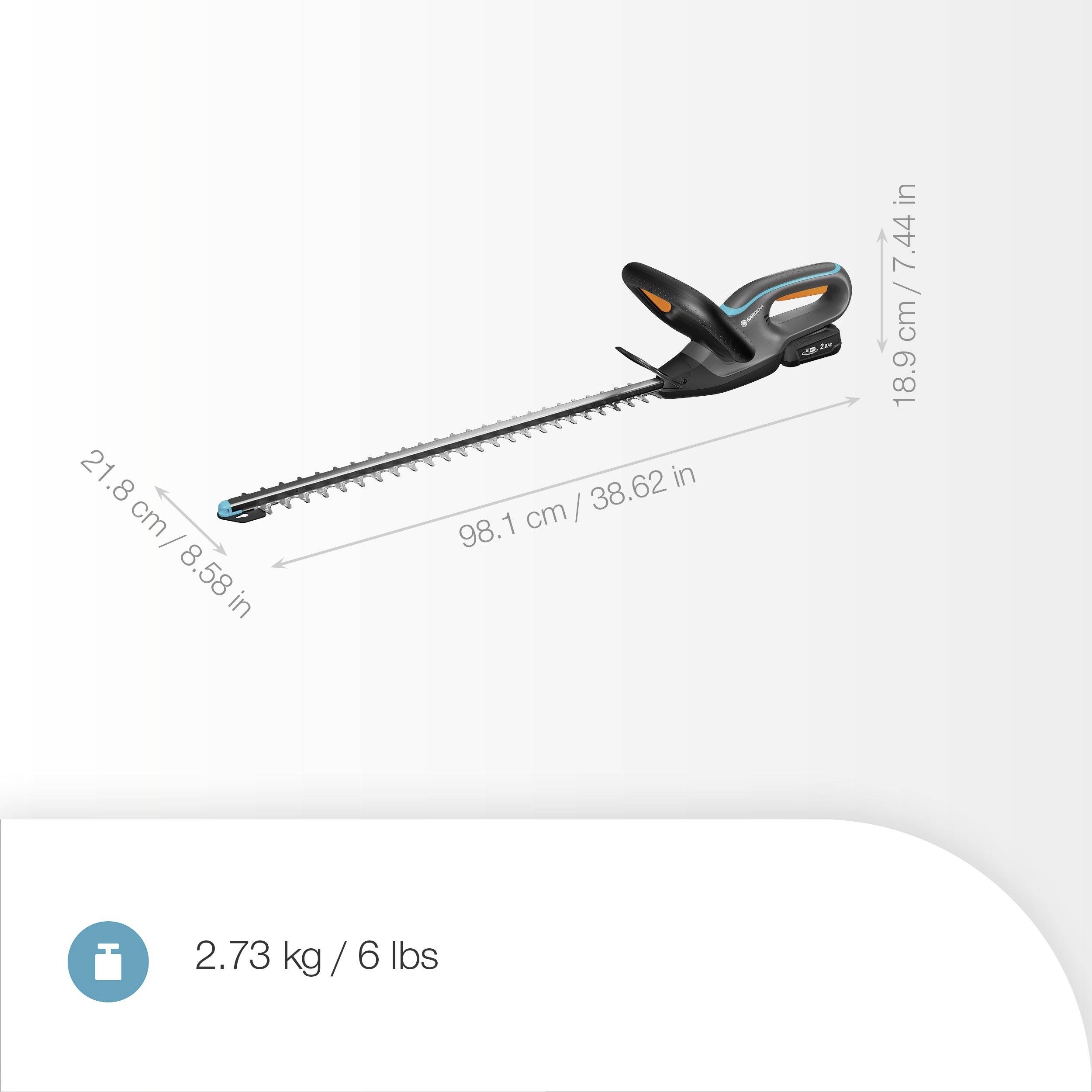 Elektrický plotostřih s dvěma rukojeťmi; délka čepele 98,1 cm, hmotnost 2,73 kg (6 liber).