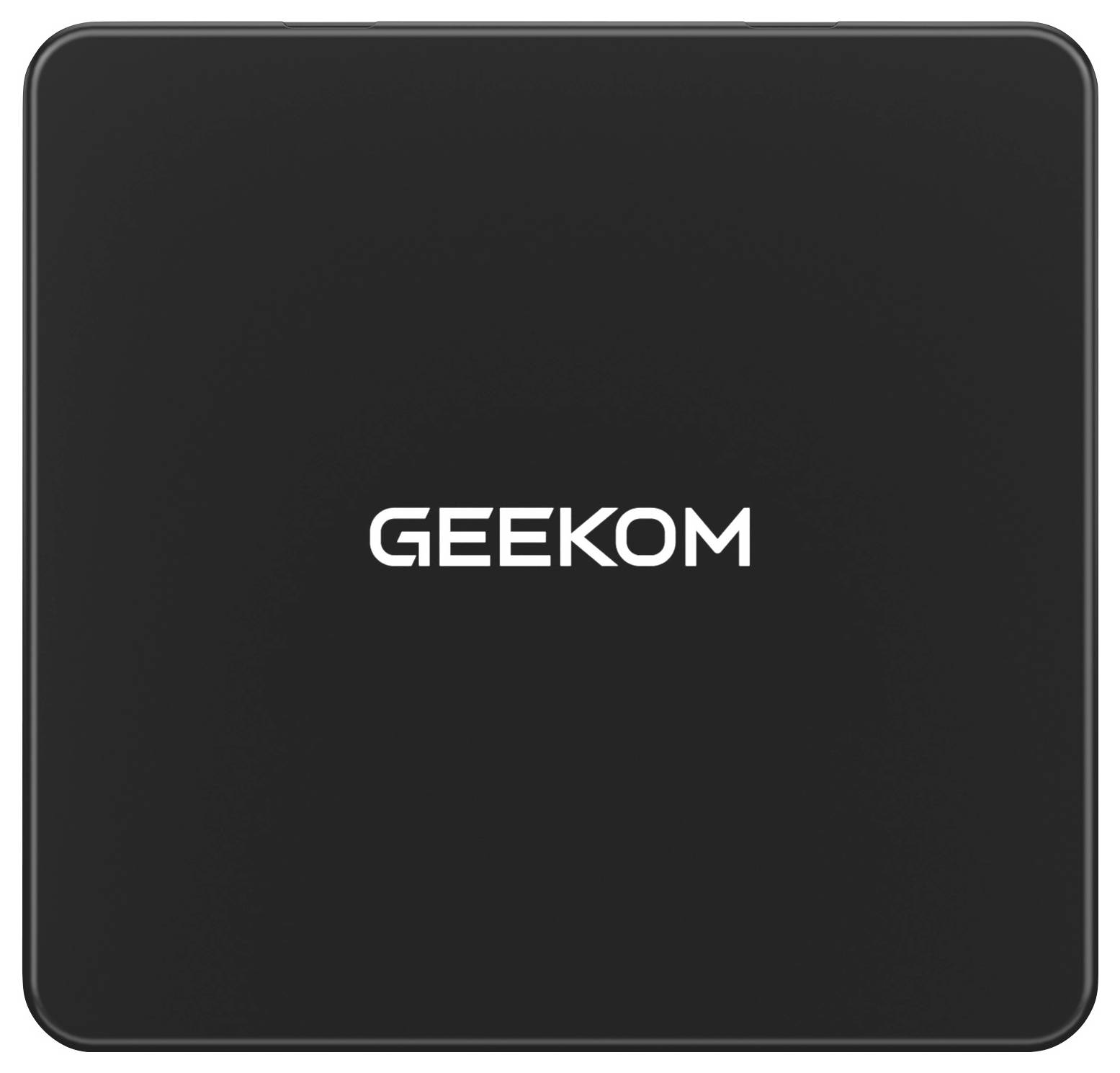 Černé elektronické zařízení s nápisem 'GEEKOM' umístěným uprostřed jeho povrchu.