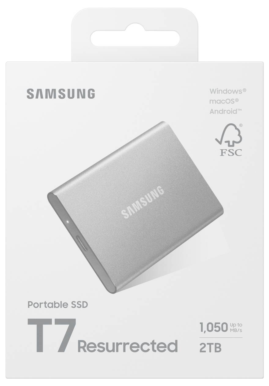 Obal přenosného SSD disku Samsung T7. Stříbrný SSD disk je zobrazen na krabici. Kompatibilní s Windows, macOS, Android. '2TB, 1 050 MB/s'.