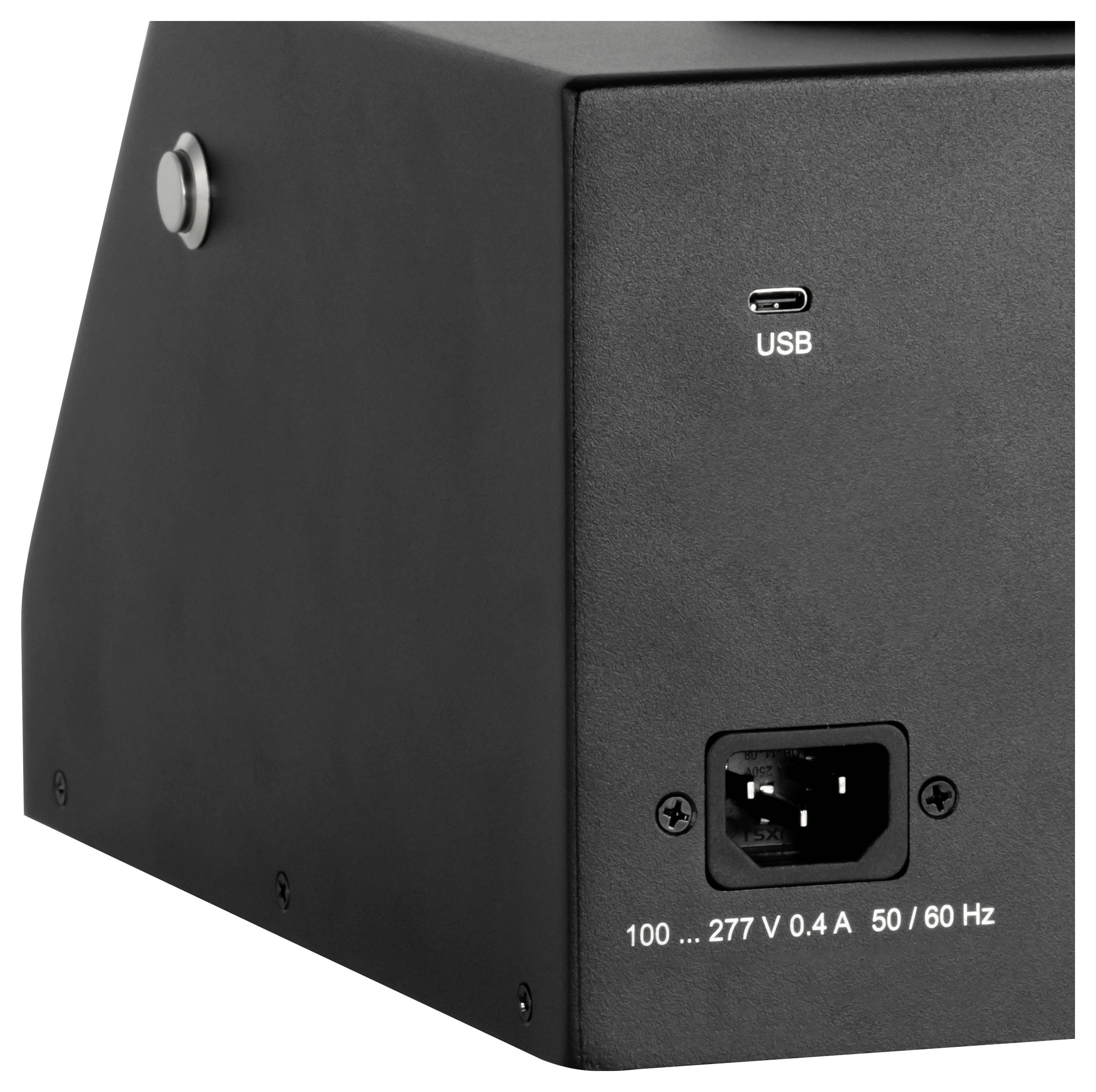 Zadní panel černého kovového zařízení s portem USB-C označeným "USB" a vstupem střídavého proudu označeným 100–277 V, 0,4 A, 50/60 Hz.