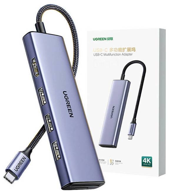 Elegantní USB-C adaptér se více porty je zobrazen spolu s jeho balením, zdůrazňující funkce 4K připojení.