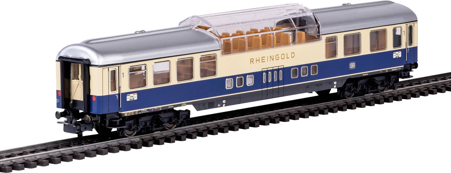 Modelový vlak s modro-béžovým designem, označený "RHEINGOLD", na krátké trati, vykazující luxusní okna a sedadla.