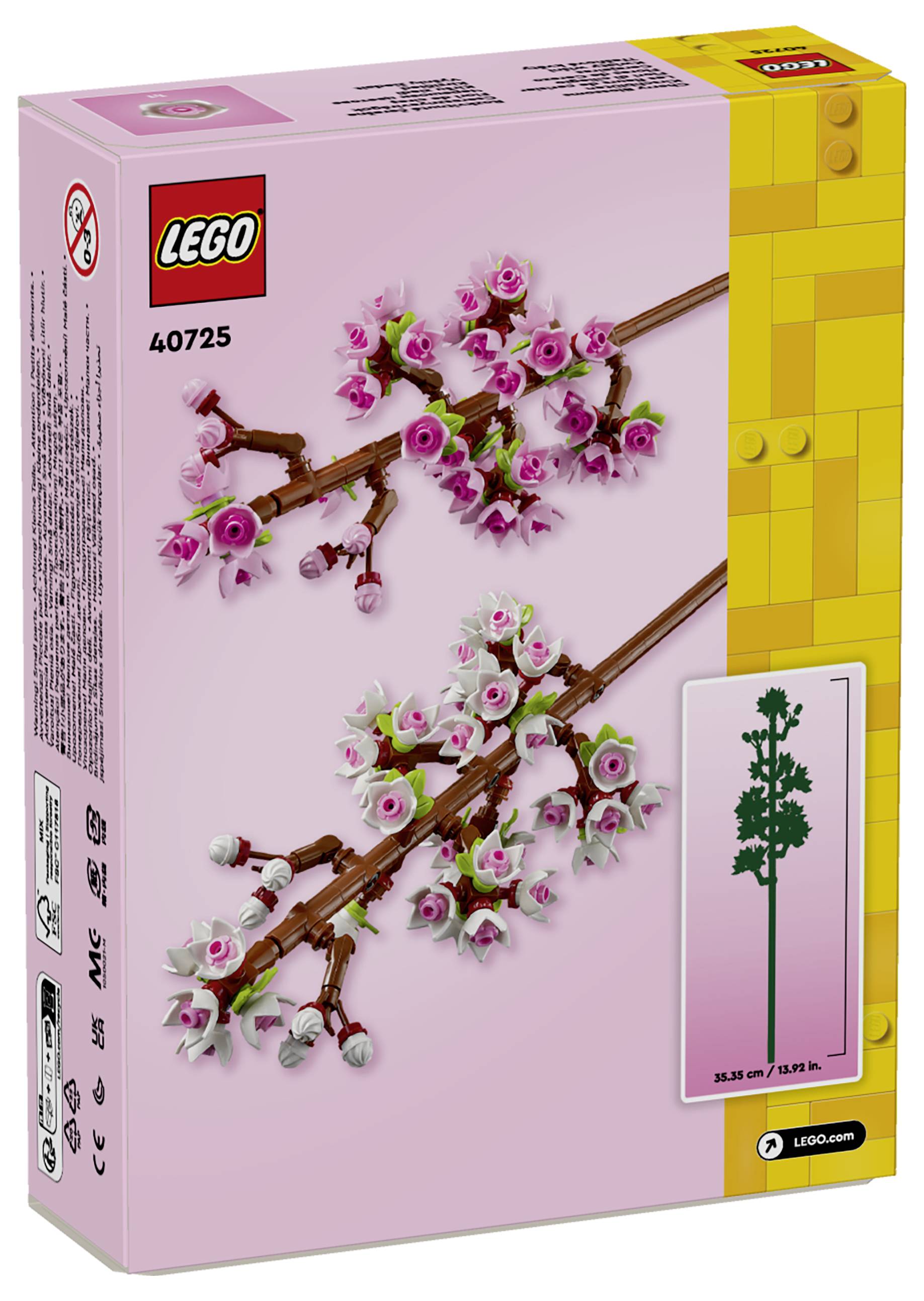 Krabice sady LEGO s větvičkami sakury na růžovém pozadí, číslo modelu 40725, zobrazující složité květinové detaily.