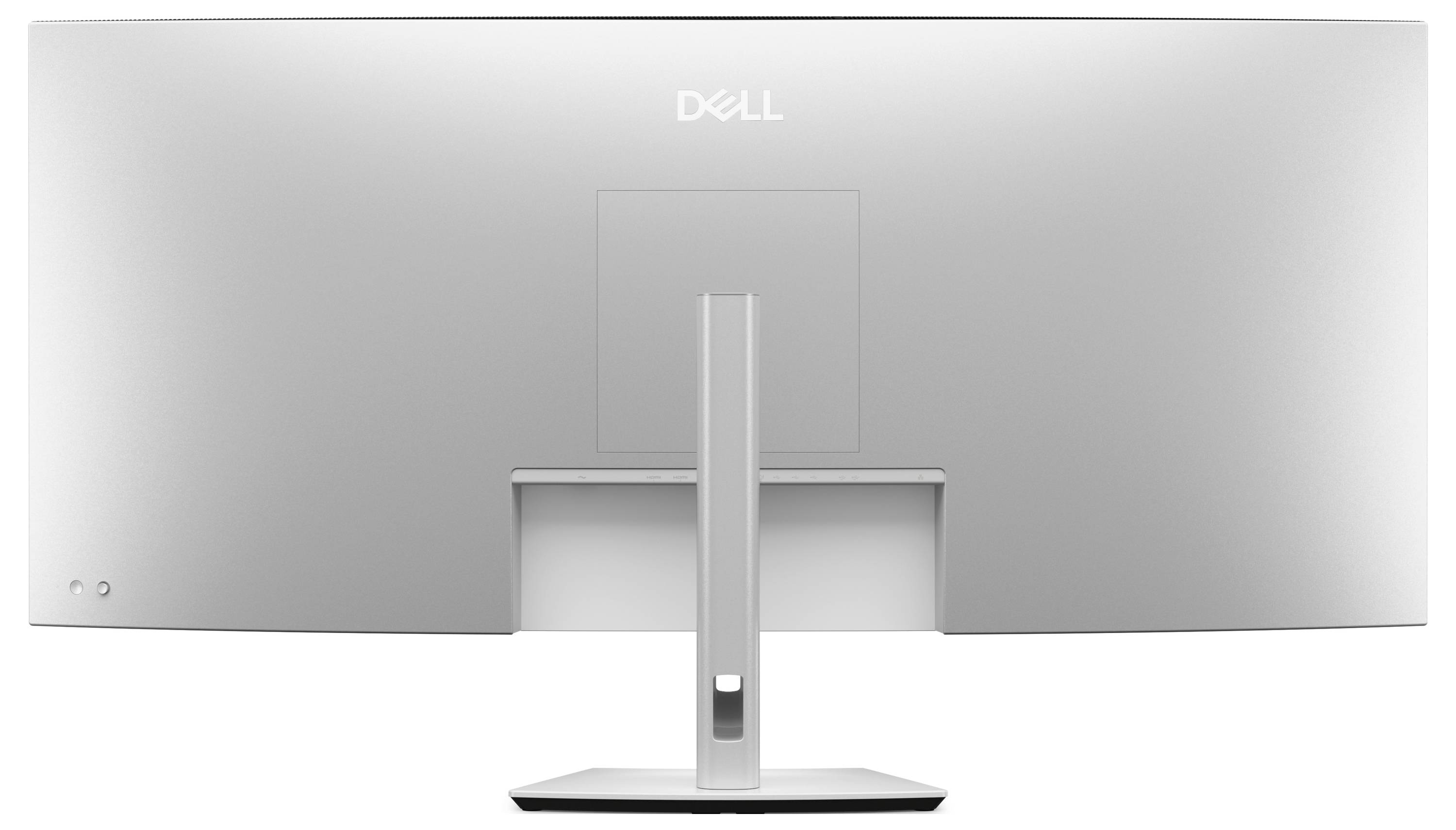 Stříbrný počítačový monitor Dell zobrazený zezadu s centrálním podstavcem a čistým, minimalistickým designem.