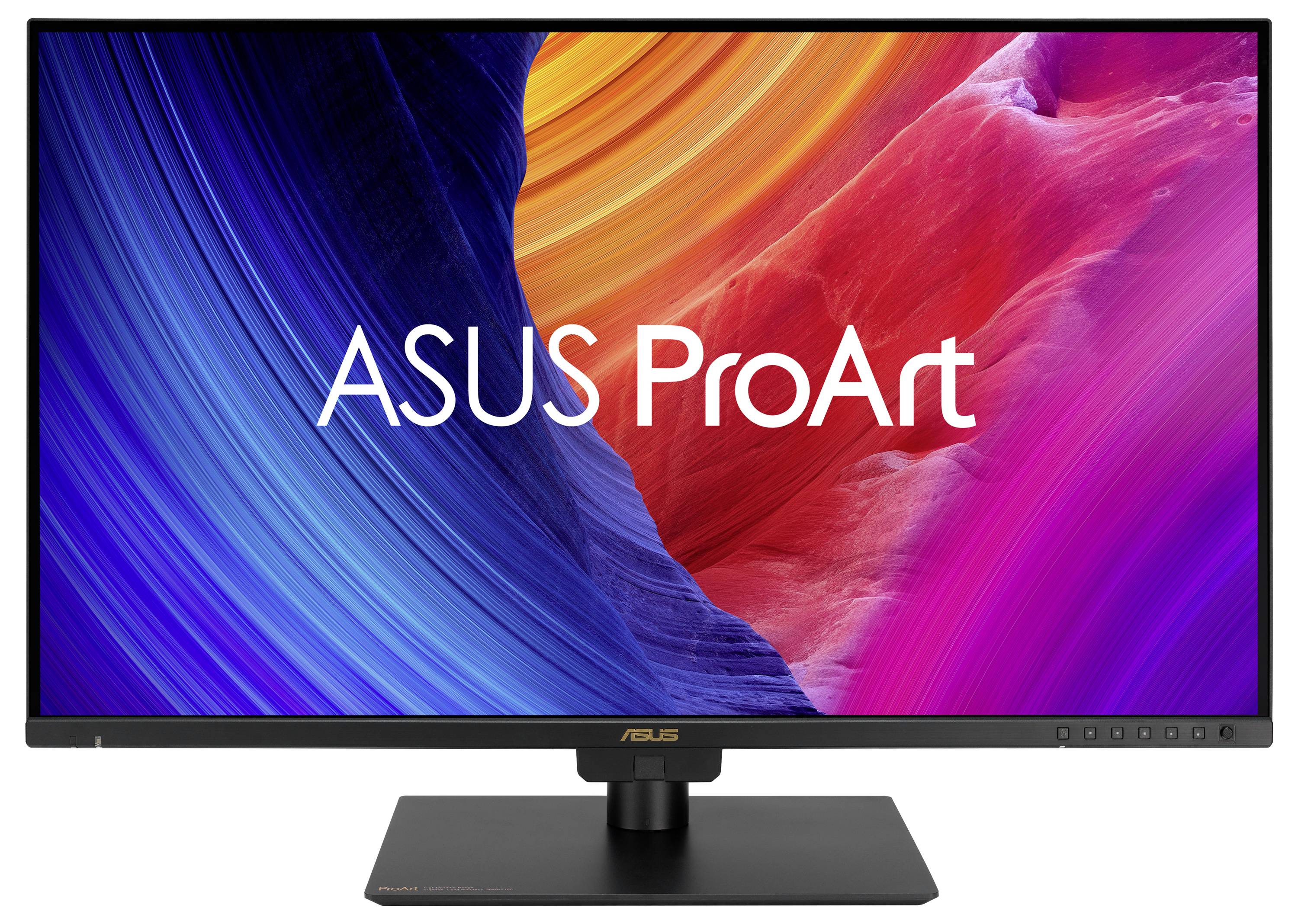 Počítačový monitor zobrazující dynamické, barevné abstraktní umění s textem "ASUS ProArt" na obrazovce.