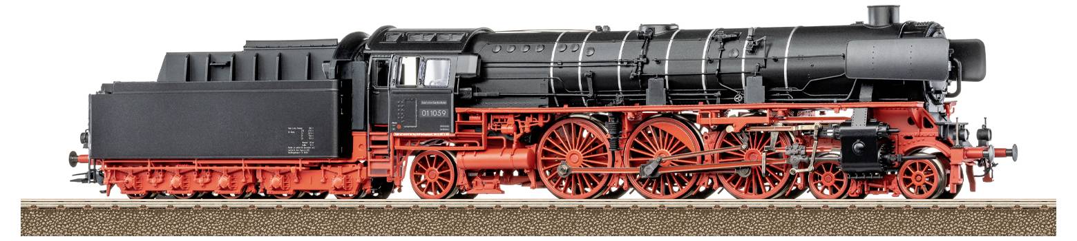 Detailní model černé a červené parní lokomotivy, který vykazuje složitá kola a mechanismy, vystavený na trati.