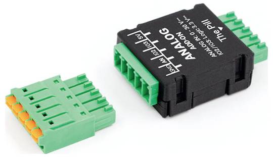 "Analog The Pill" blok se zelenými konektory pro modulární elektroniku.