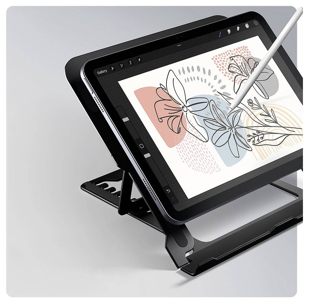 Digitální tablet na stojanu zobrazuje květinové umění vytvářené stylusem, obsahující abstraktní květiny v pastelových barvách.