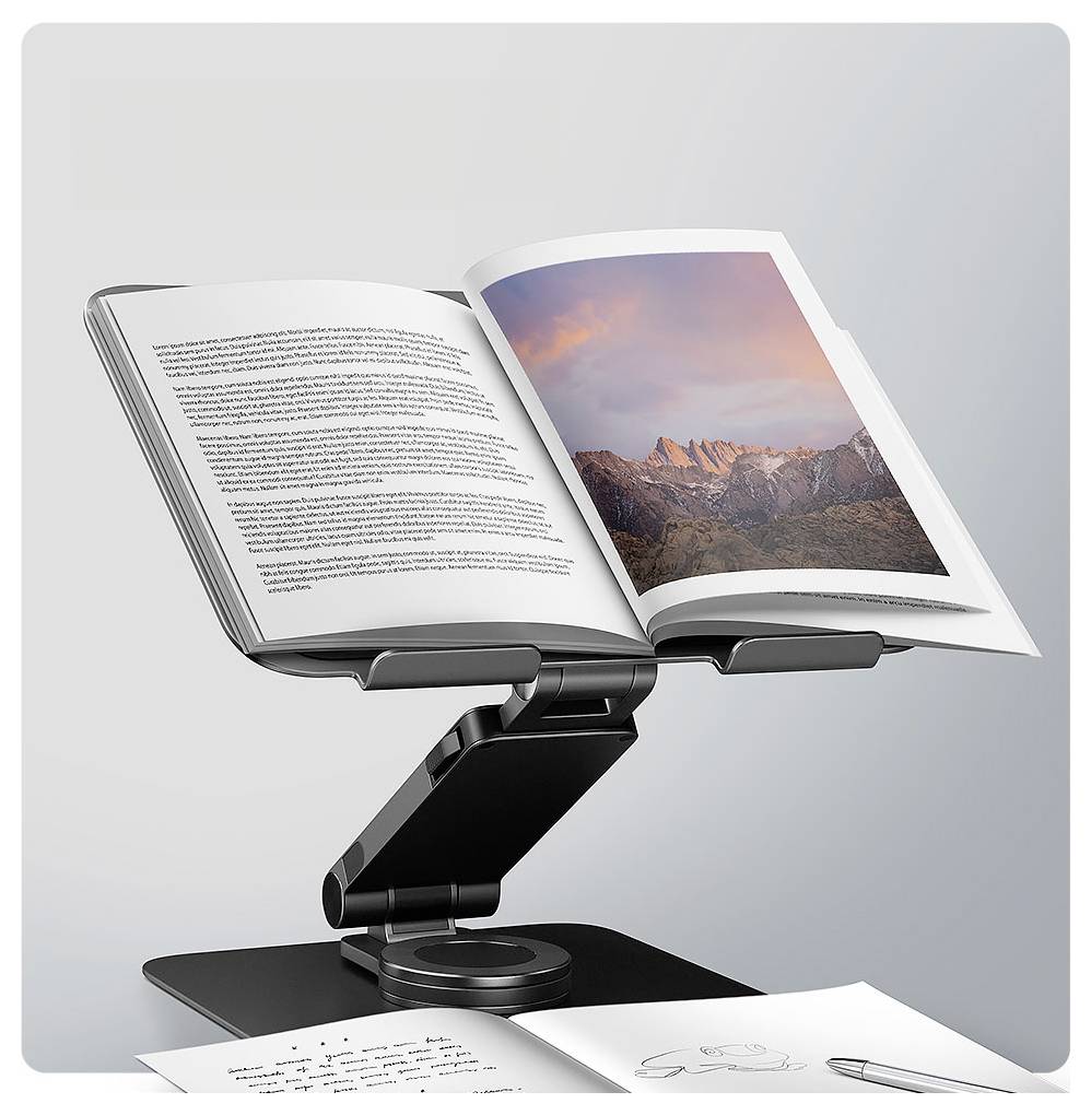 Ergonomický stojánek na knihy drží otevřenou knihu zobrazující krajinnou fotografii. Stránky jiného dokumentu leží na stole níže.