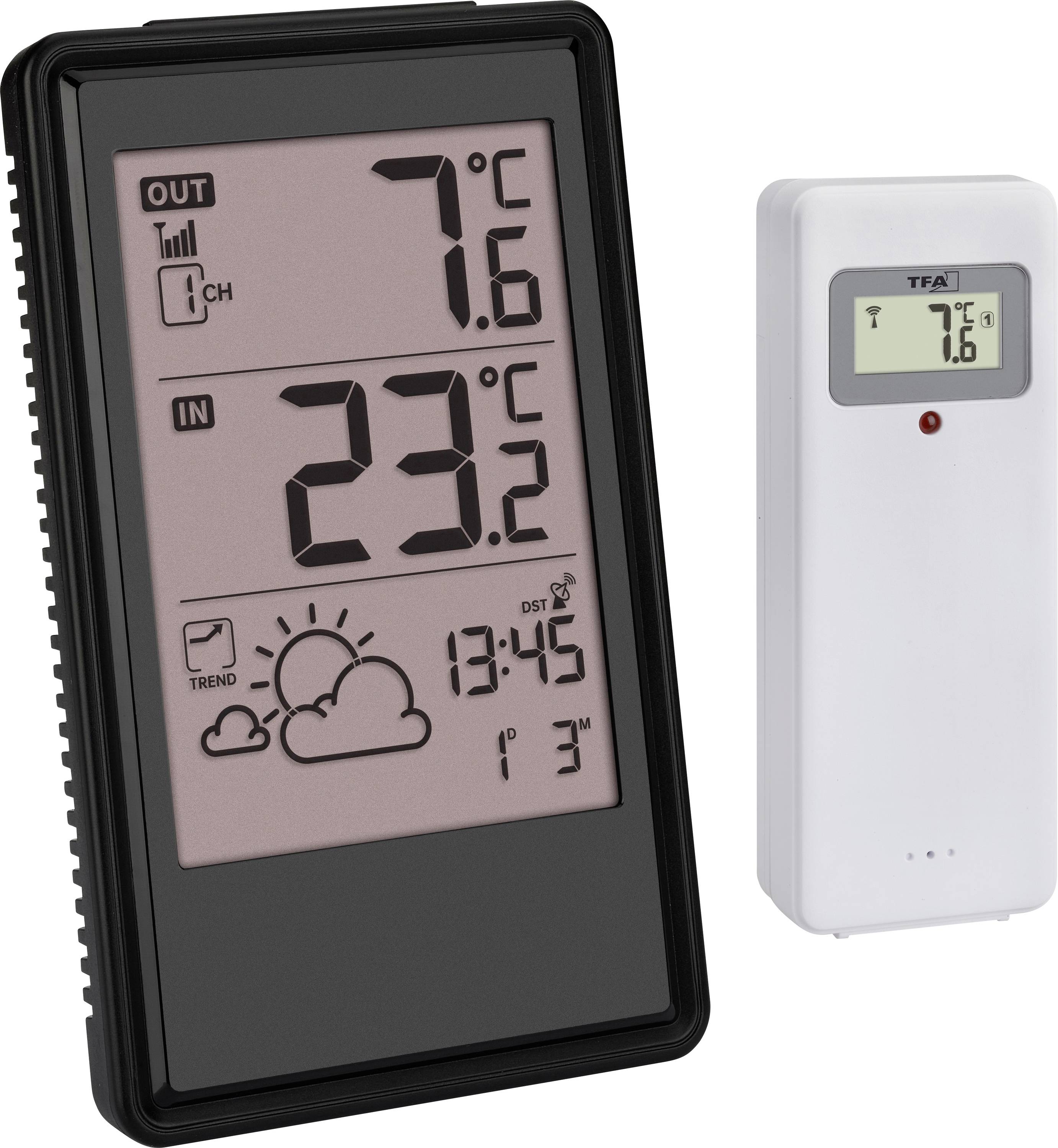 Digitální displej teploměru ukazuje 7,6 °C venku a 23,2 °C uvnitř. Ikona označuje jasné počasí se symbolem slunce.