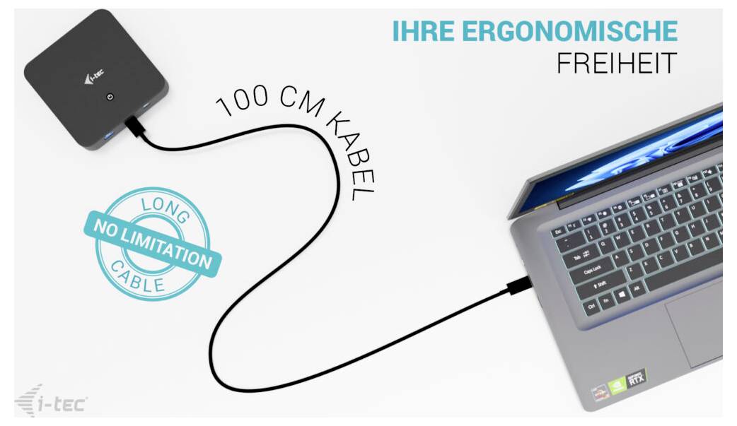 Přenosný počítač připojený k externímu zařízení pomocí kabelu dlouhého 100 cm. Text zní Vaše ergonomická svoboda.