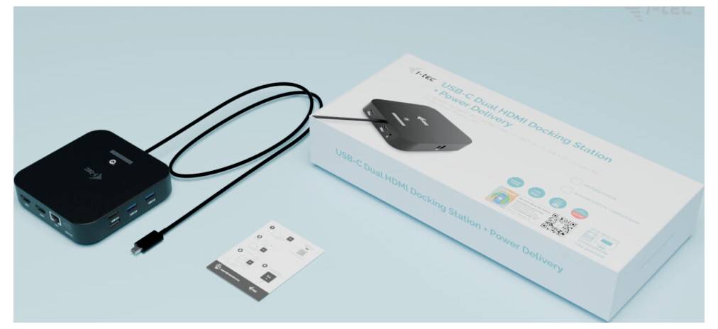 Dokovací stanice USB-C se dvěma HDMI, která podporuje přenos energie, spolu s jejím balením, kabelem a průvodcem nastavením na světle modré ploše.