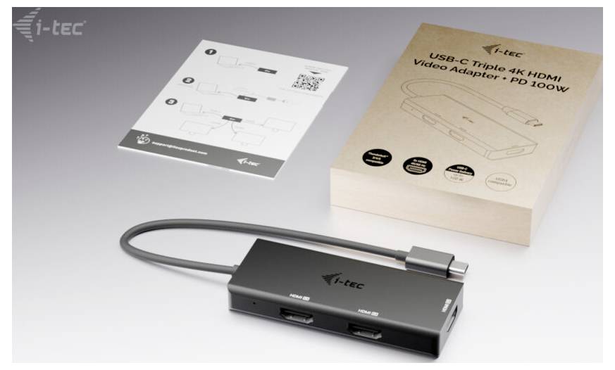 Je zobrazen USB-C trojitý 4K HDMI video adaptér s kabelem spolu s jeho obalem a instruktážním listem. Značka: i-tec.