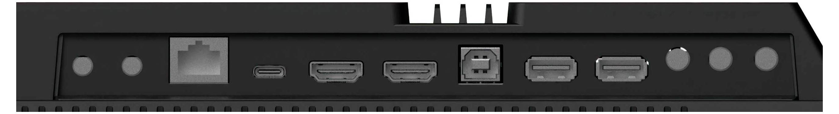 Porty na zařízení zleva doprava: Ethernet, USB, dva HDMI, napájení, další USB a dva kruhové porty.