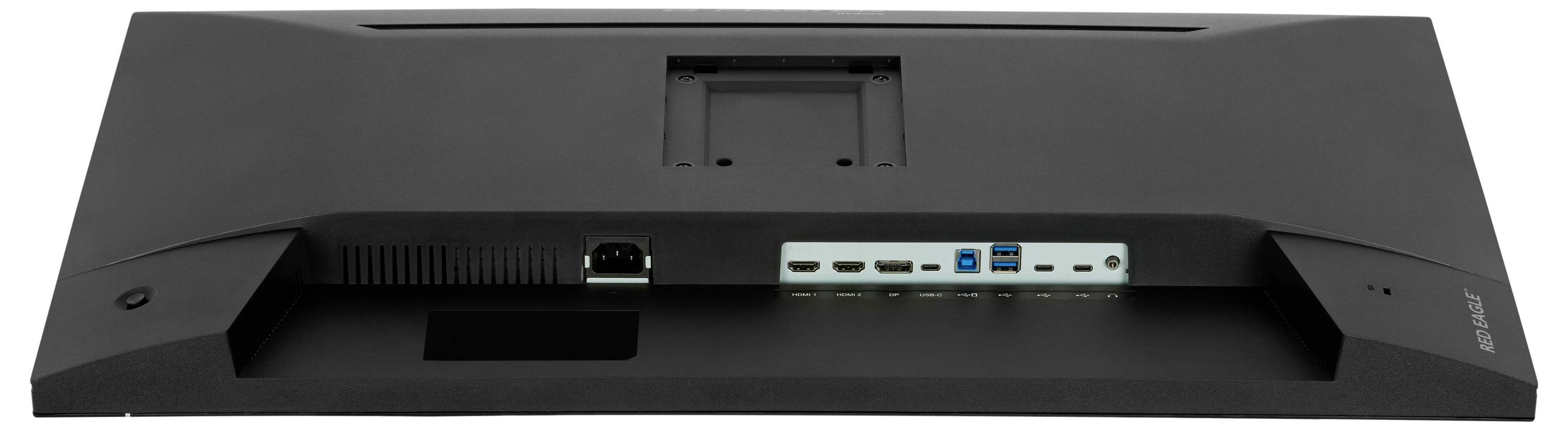 Ploché černé elektronické zařízení s více porty na zadním panelu, včetně připojení HDMI, USB a Ethernet, určené pro nastavení a připojení.