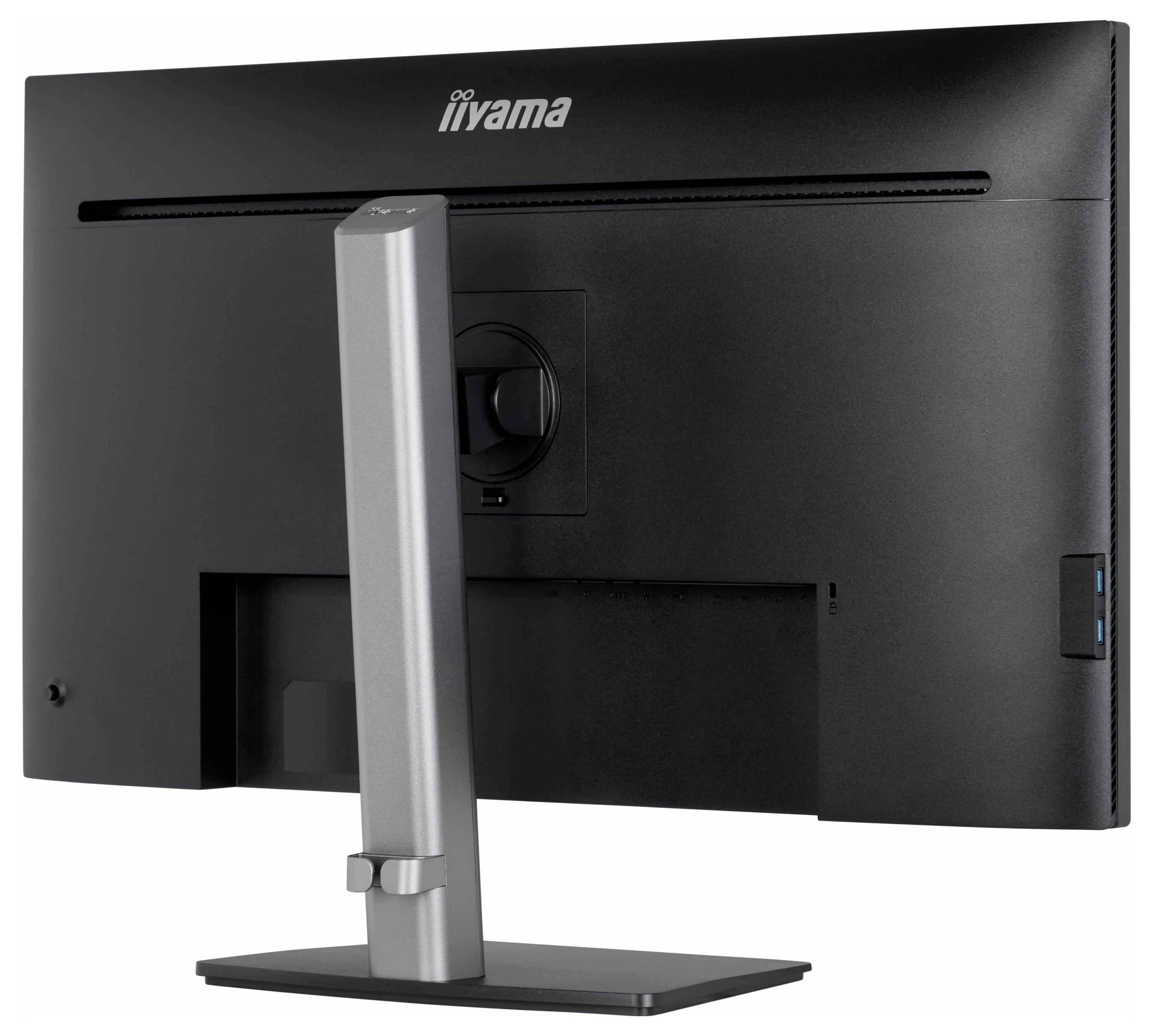 Černý počítačový monitor se stříbrným stojanem, pohled zezadu, zobrazující porty a nastavovací mechanismy na zadním panelu.