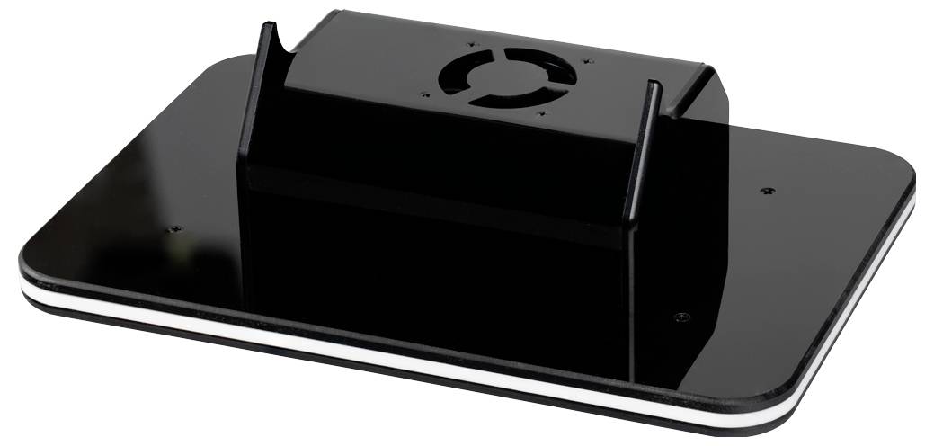 Černá elektronická zařízení základna se zvýšeným centrálním pouzdrem a kulatým otvorem pro větrání, zobrazená na bílém pozadí.