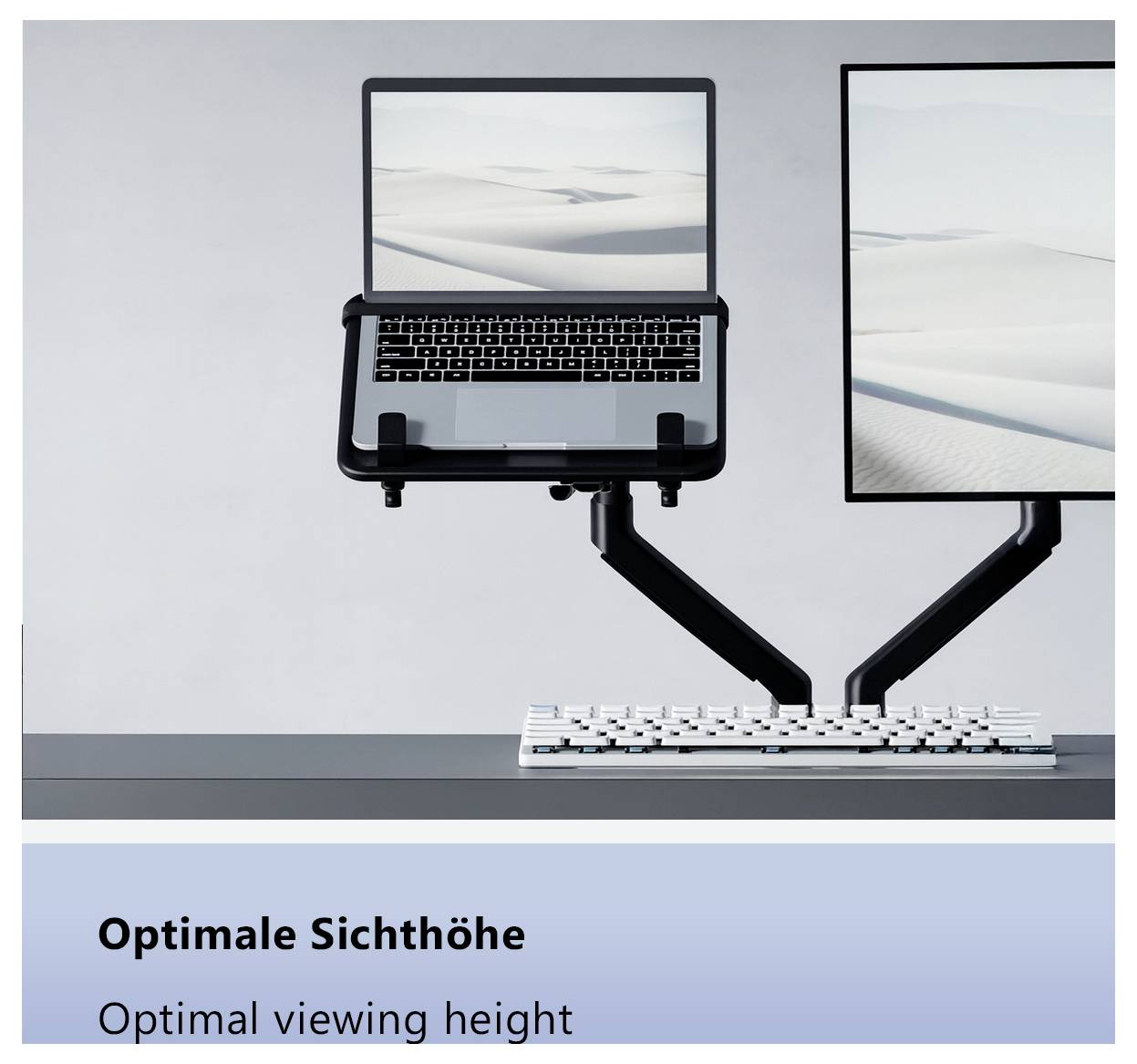 Přenosný počítač na nastavitelném rameni vedle monitoru. Níže je klávesnice. Text zní „Optimální výška pohledu."
