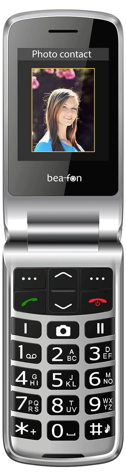 Překlapovací telefon zobrazující fotokontakt na displeji. Klávesnice má velká tlačítka s čísly a symboly pro snadné použití.