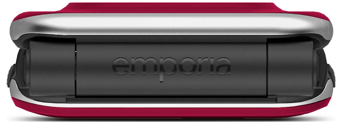 Červený a stříbrný skládací telefon v zavřené poloze s logem „emporia" vytlačeným na jeho černé závěsce.
