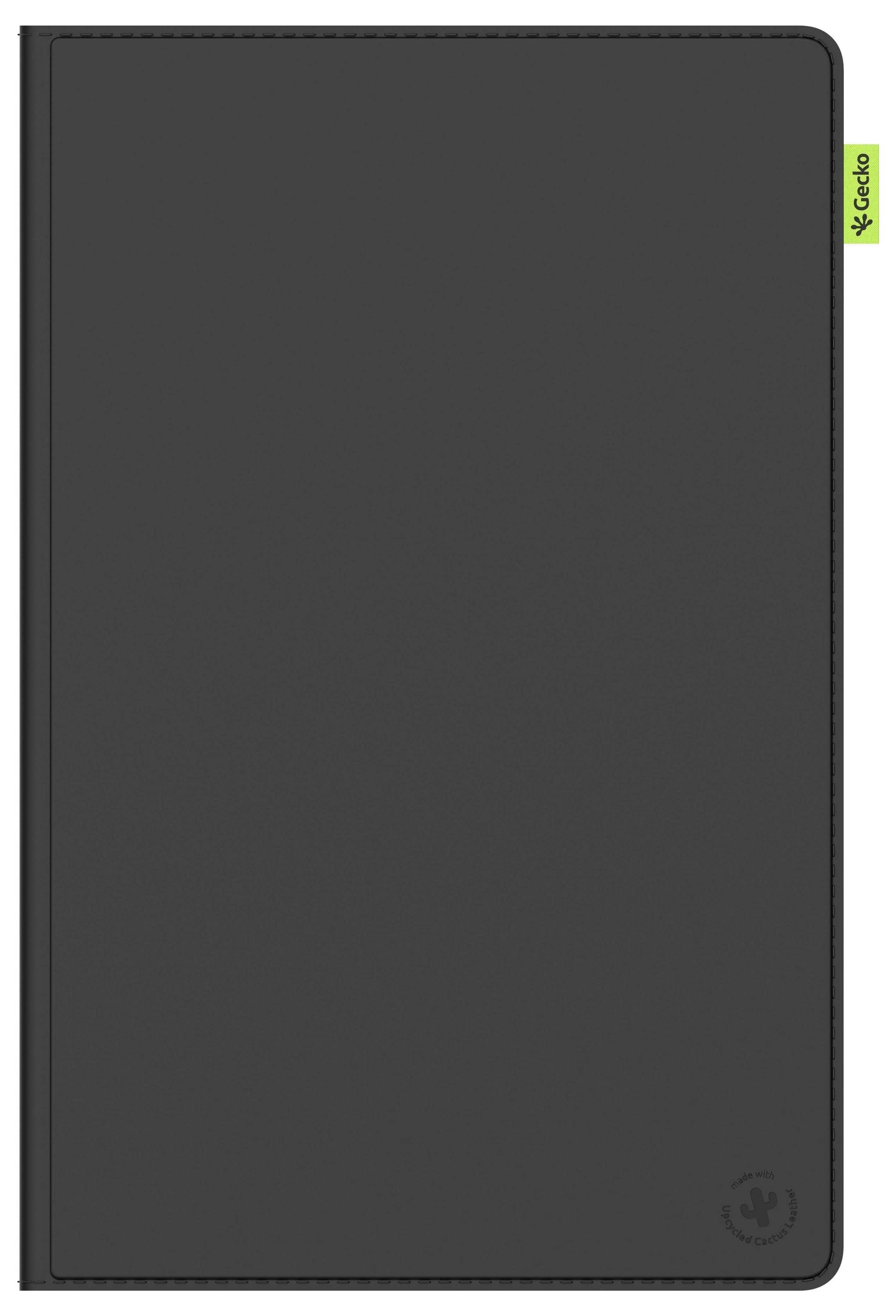 Černý notebook se zeleným záložkou zobrazující slovo "Gecko" na straně.