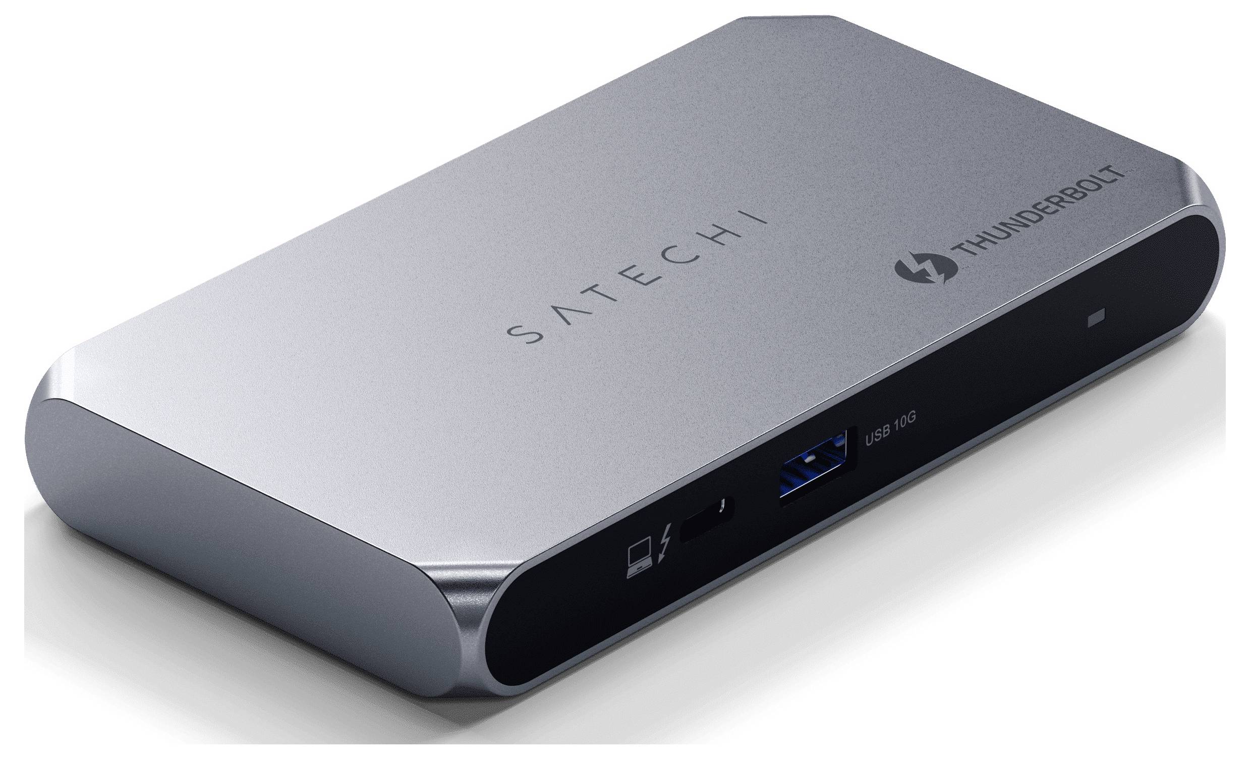 Elegantní, šedý Satechi Thunderbolt hub s více porty, včetně USB 3.0 pro připojování různých zařízení.