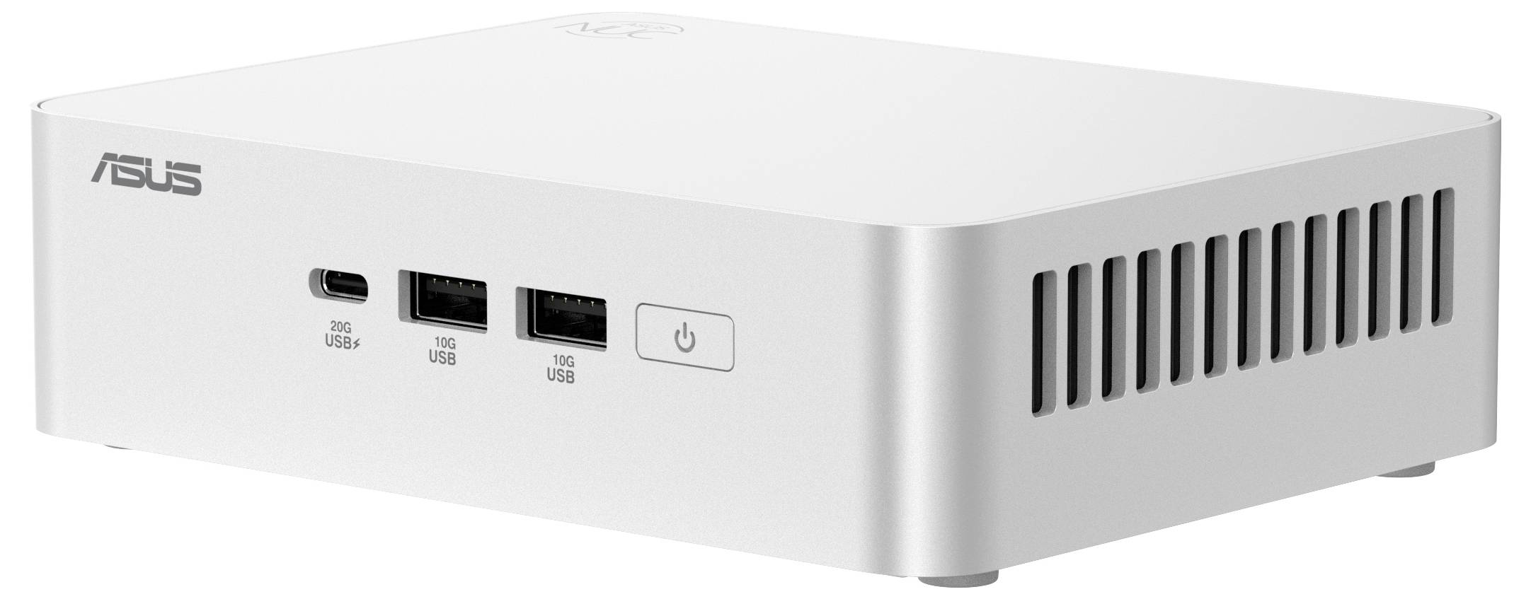 Asus mini-počítač ve stříbrné barvě s ventilačními štěrbinami na straně, s dvěma porty USB-A, jedním portem USB-C a tlačítkem napájení na přední straně.