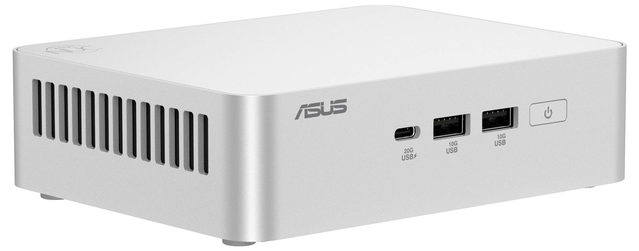 Malý, obdélníkový, stříbrný mini PC značky ASUS s ventilačními štěrbinami, USB porty a tlačítkem napájení na přední straně.