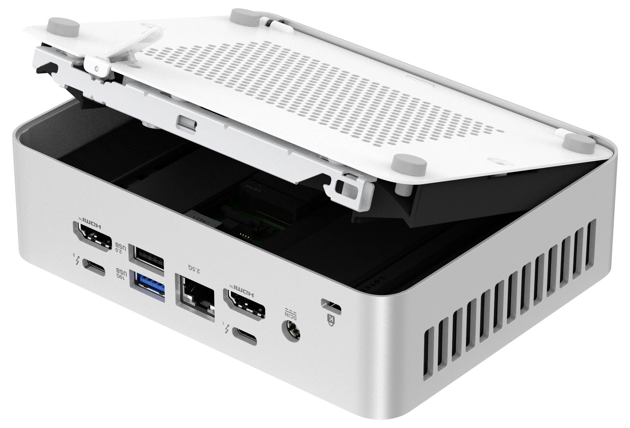 Kompaktní pouzdro počítače je otevřené a odhaluje interní porty včetně USB, HDMI a napájecích konektorů s viditelným větrácím otvory.