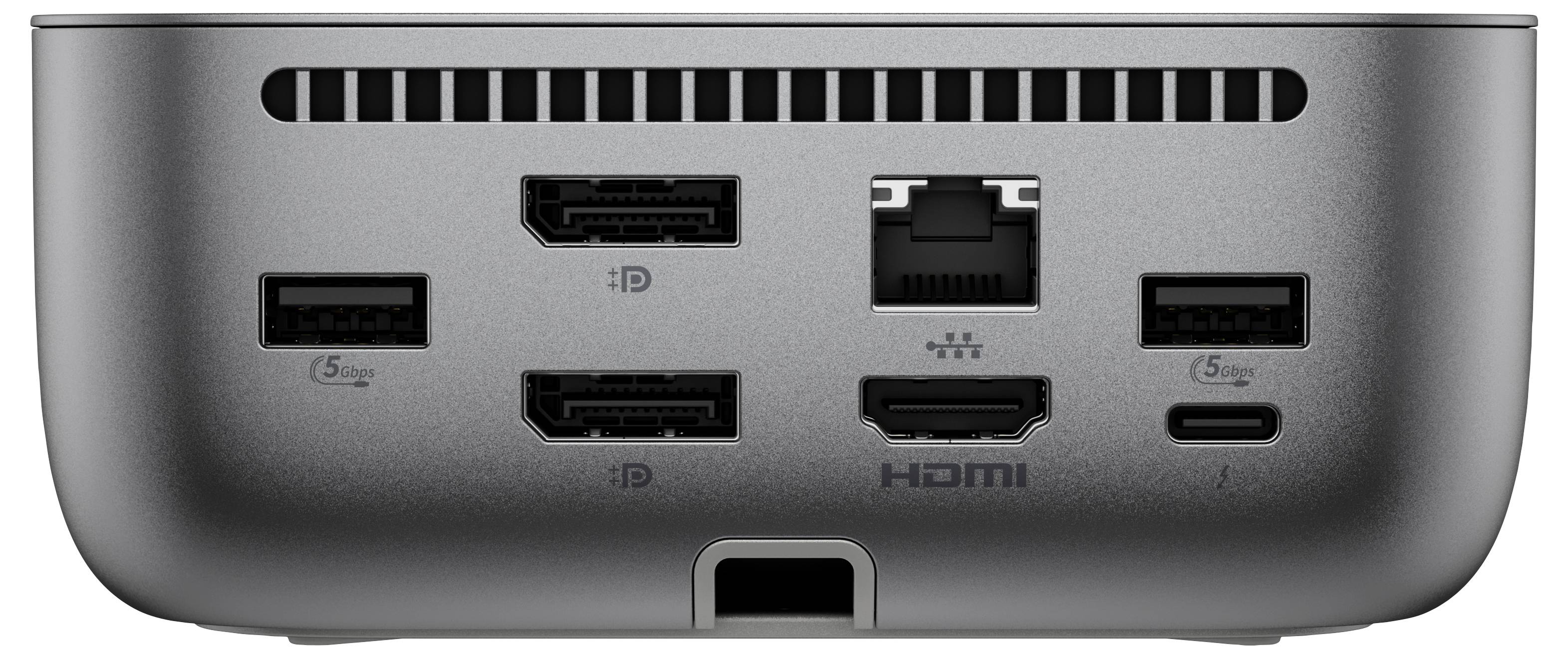 Obrázek ukazuje zadní stranu šedého počítačového zařízení s různými porty: tři USB-A, dva HDMI, jeden Ethernet a jeden USB-C port.