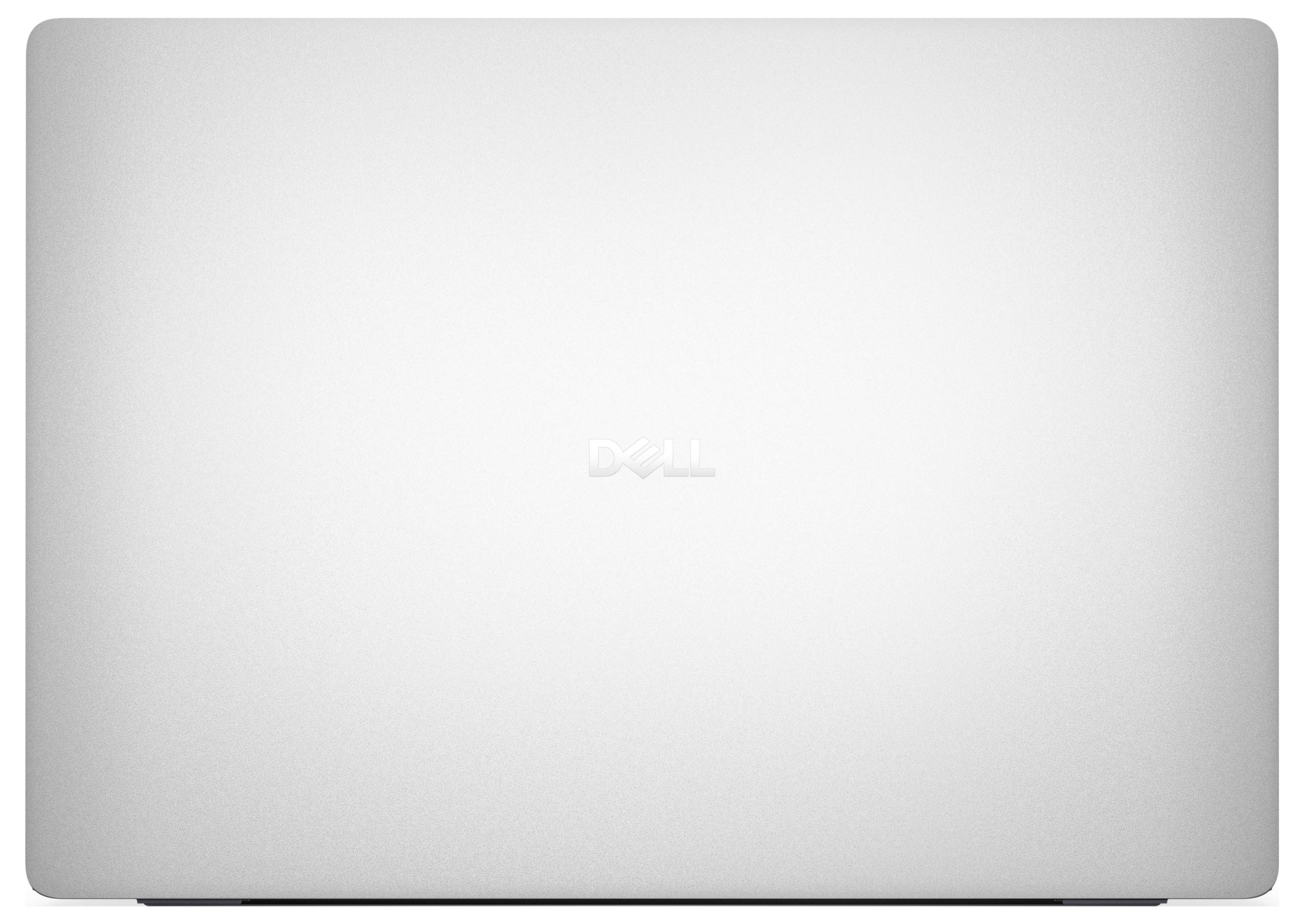 Stříbrný laptop Dell zavřený, s logem značky vycentrovaným na jeho horním krytu.