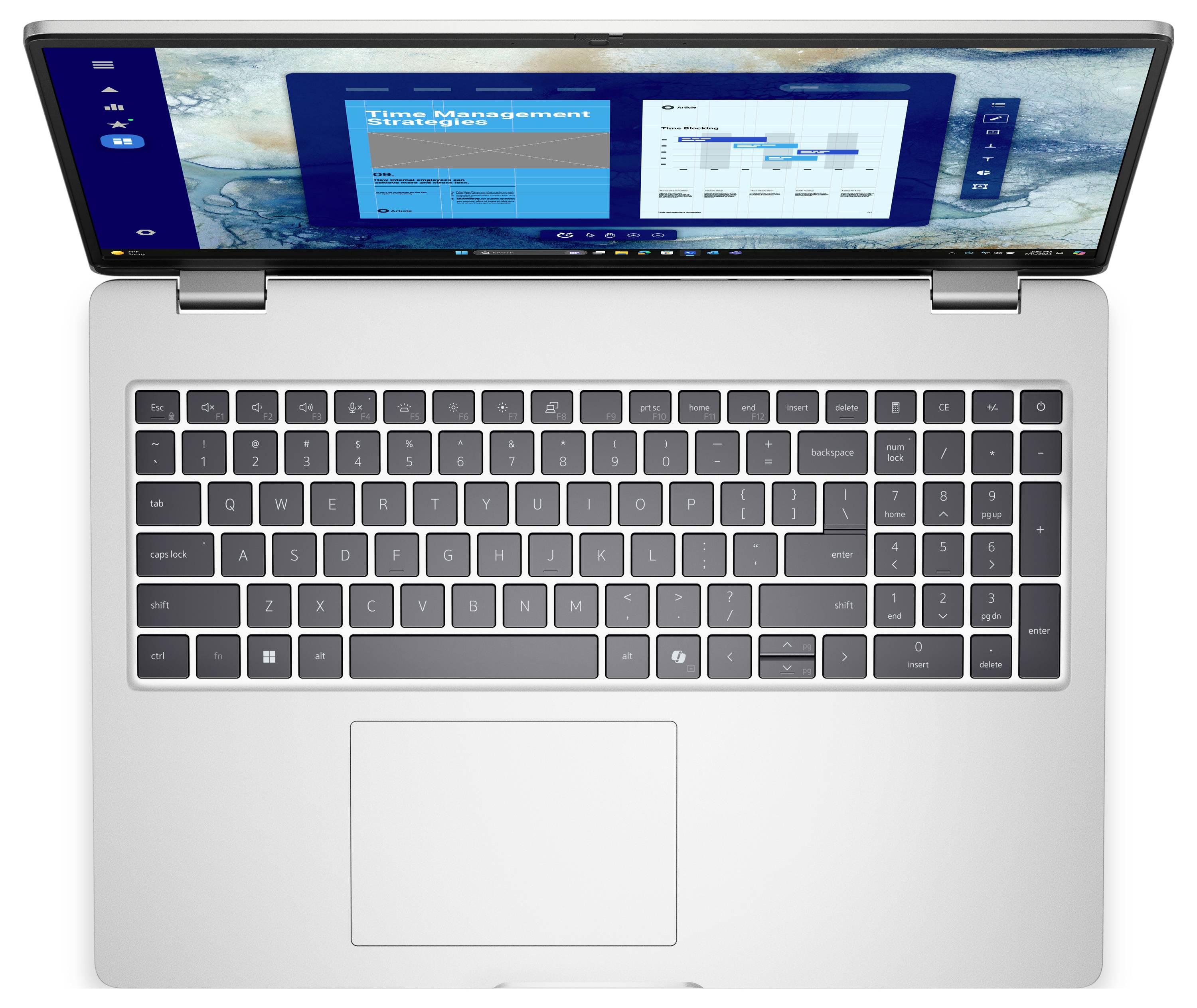 Pohled shora na otevřený laptop zobrazující rozhraní software pro správu času s grafy a plány na obrazovce.