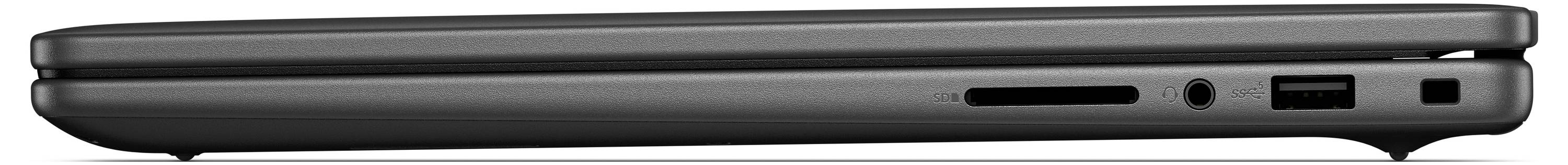 Uzavřený tenký černý notebook pohled ze strany, ukazující porty včetně USB a HDMI portu na bočním panelu.