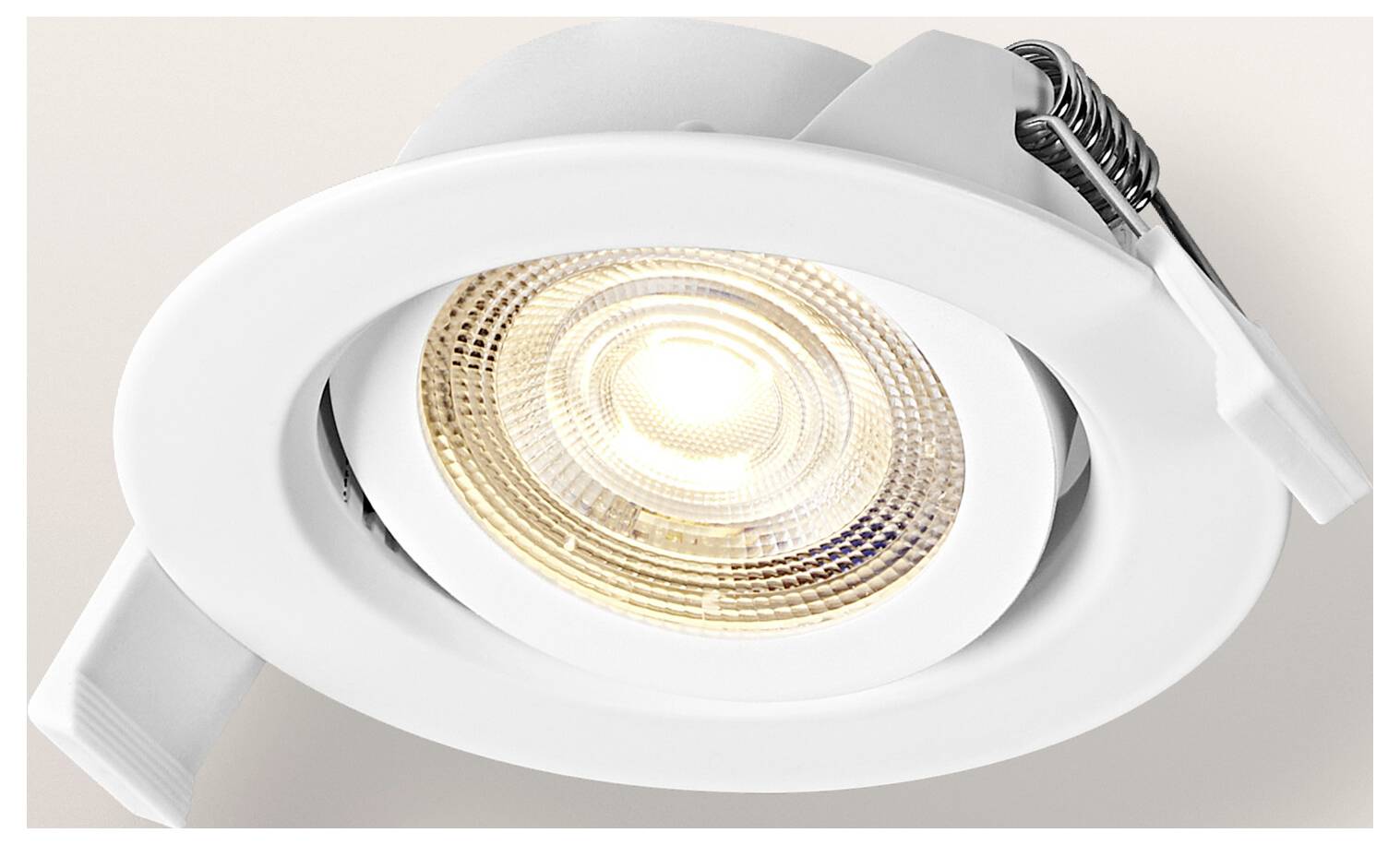 Bílé vestavné stropní bodové světlo s kulatou LED žárovkou, s elegantním, moderním designem pro vnitřní osvětlení.