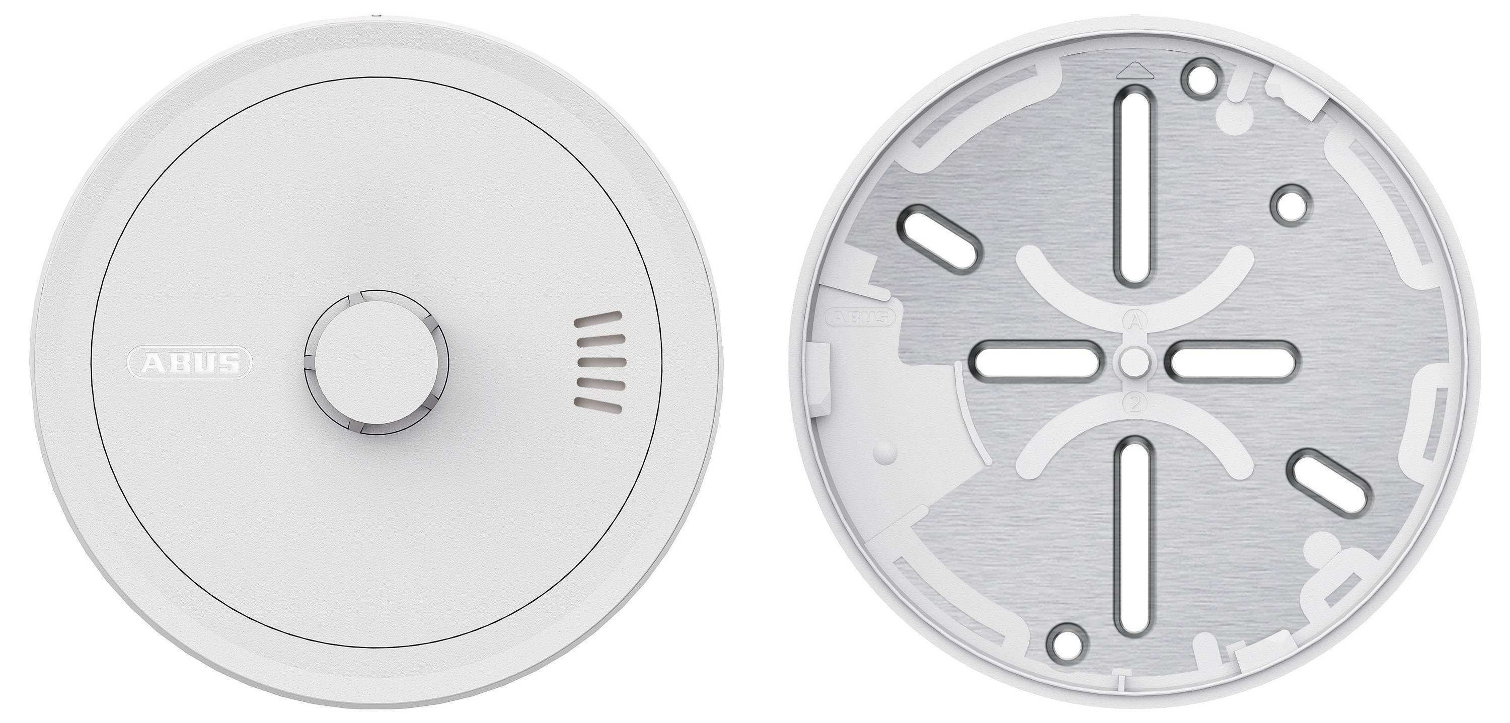 Na levé straně „detektor kouře" s elegantním bílým designem a kulatým tvarem. Pravá strana zobrazuje montážní desku se sloty pro instalaci.
