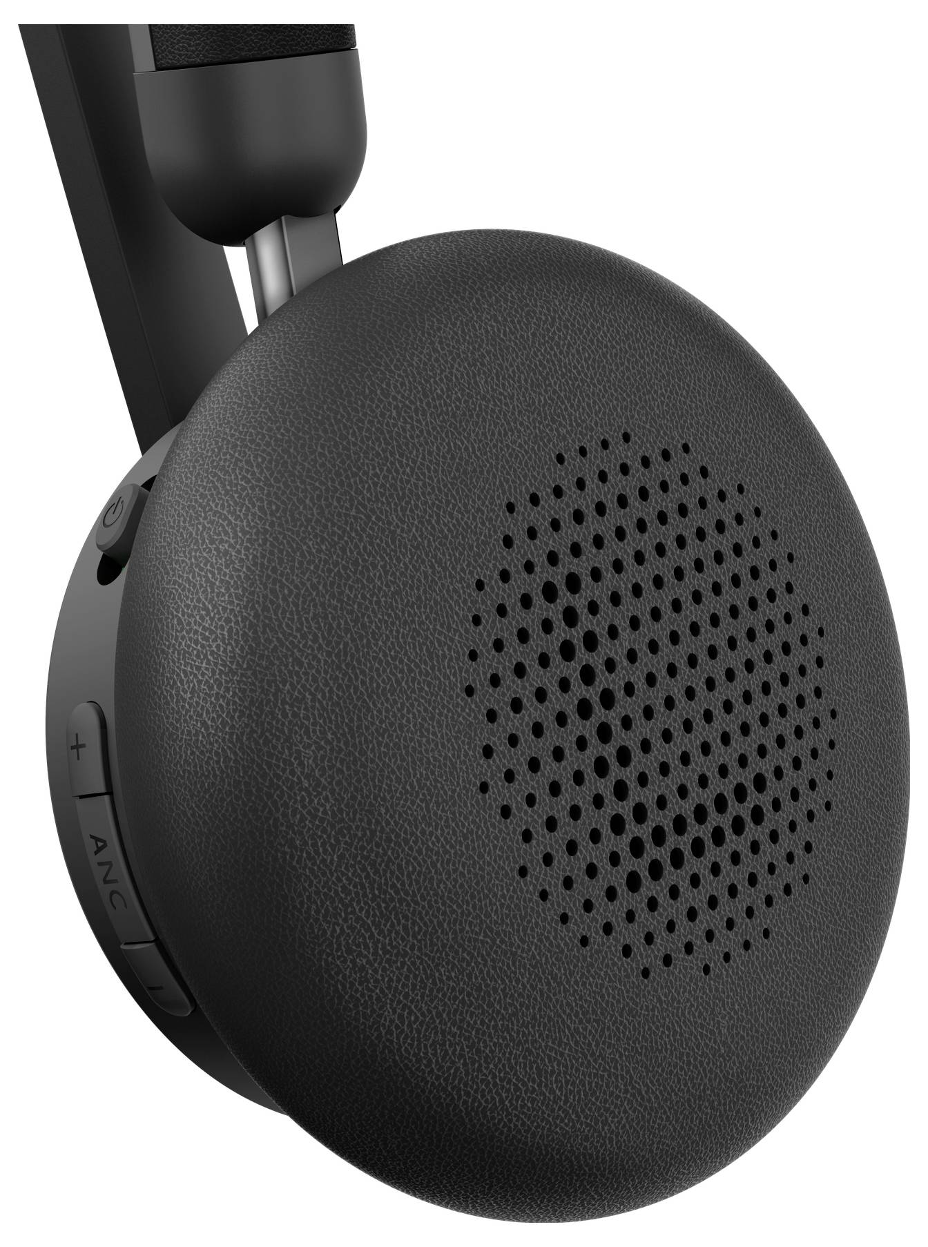 Detailní pohled na reproduktor sluchátek přes uši v černé barvě s ovládacími prvky hlasitosti na straně, zdůrazňující její elegantní design a funkčnost.