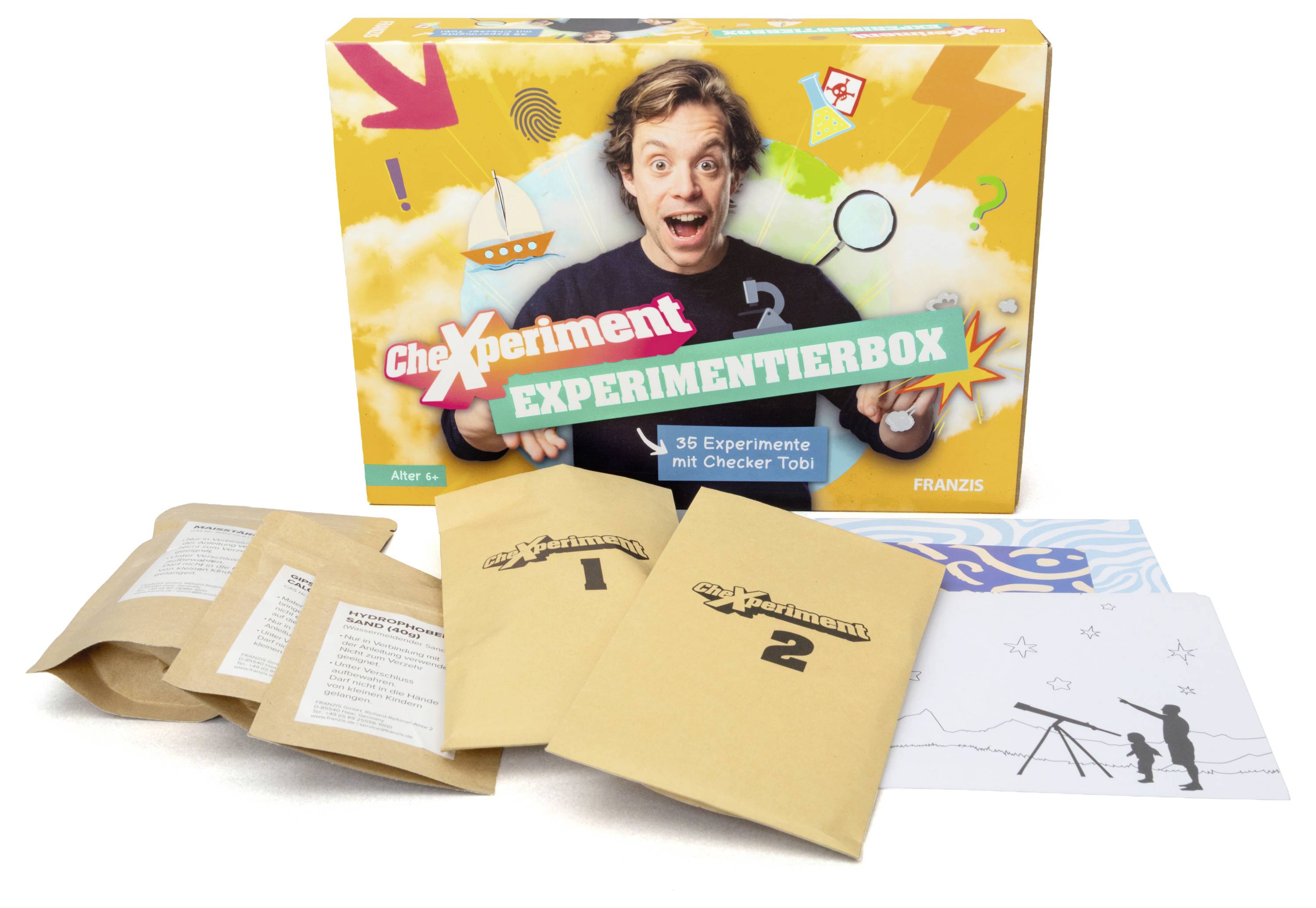 Vědecká souprava „CheXperiment" obsahující 36 pokusů s barevným balením, dvěma očíslovanými obálkami a instruktážními listy.